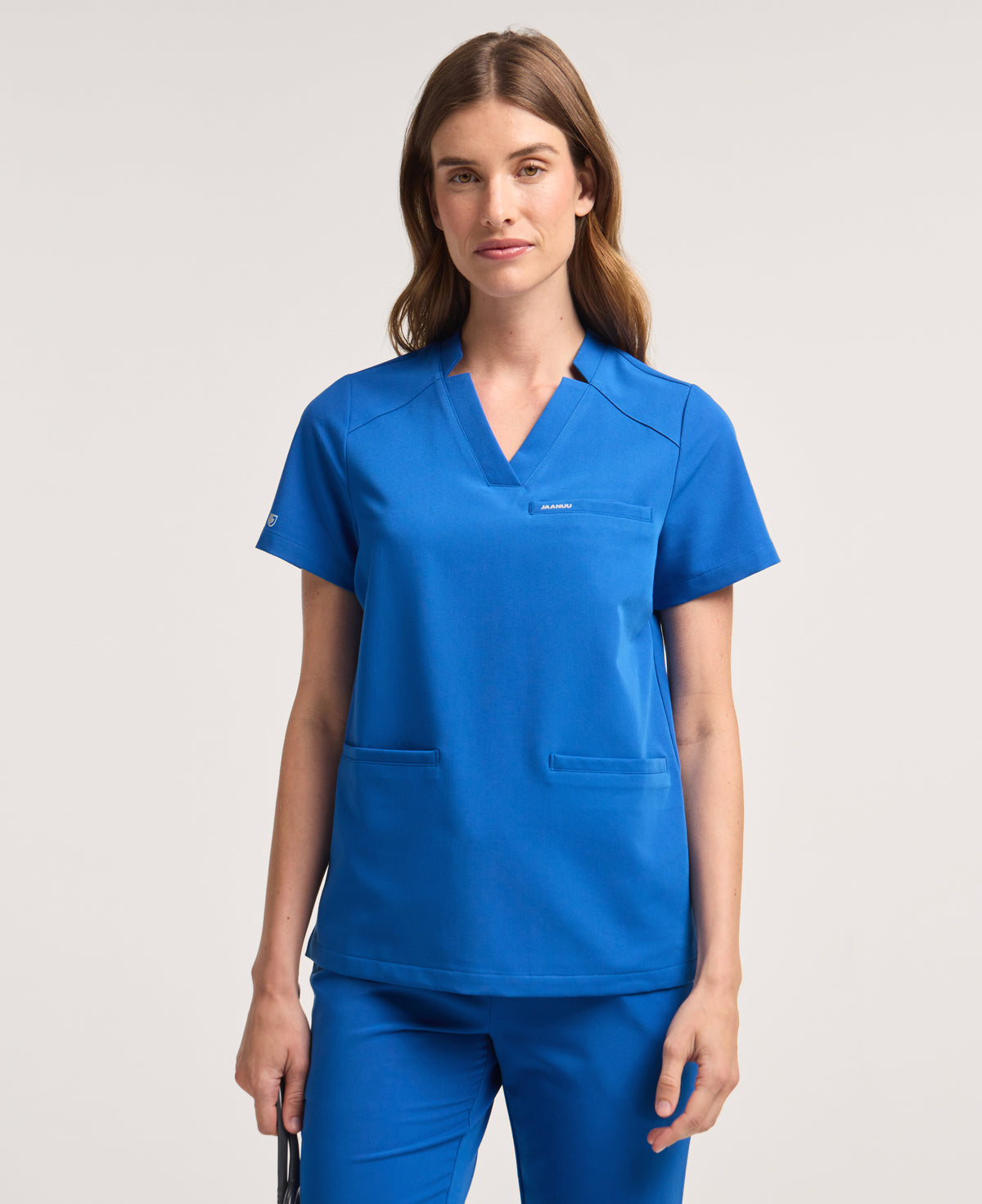 Jaanuu Helia Notched V-Neck Scrub Top in Royal Blue, product photo 1 of 6