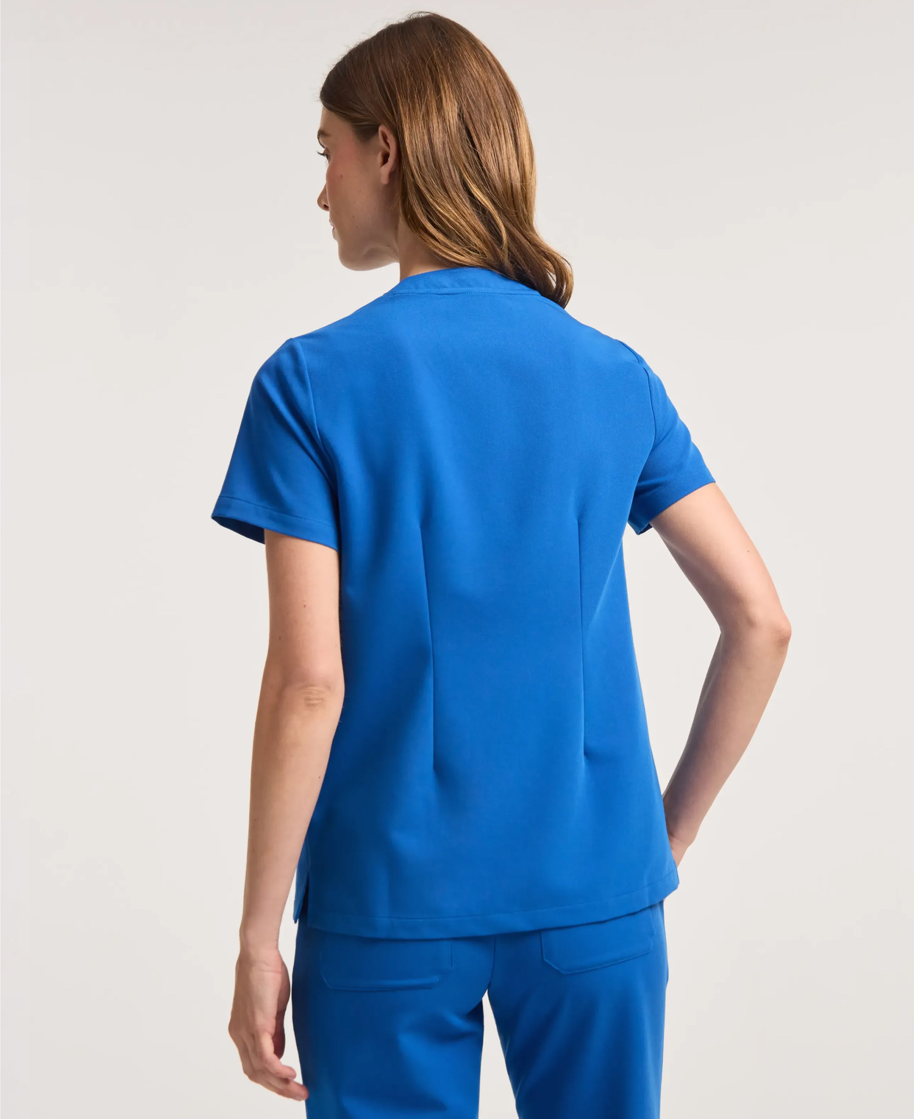 Jaanuu Helia Notched V-Neck Scrub Top in Royal Blue, product photo 6 of 6