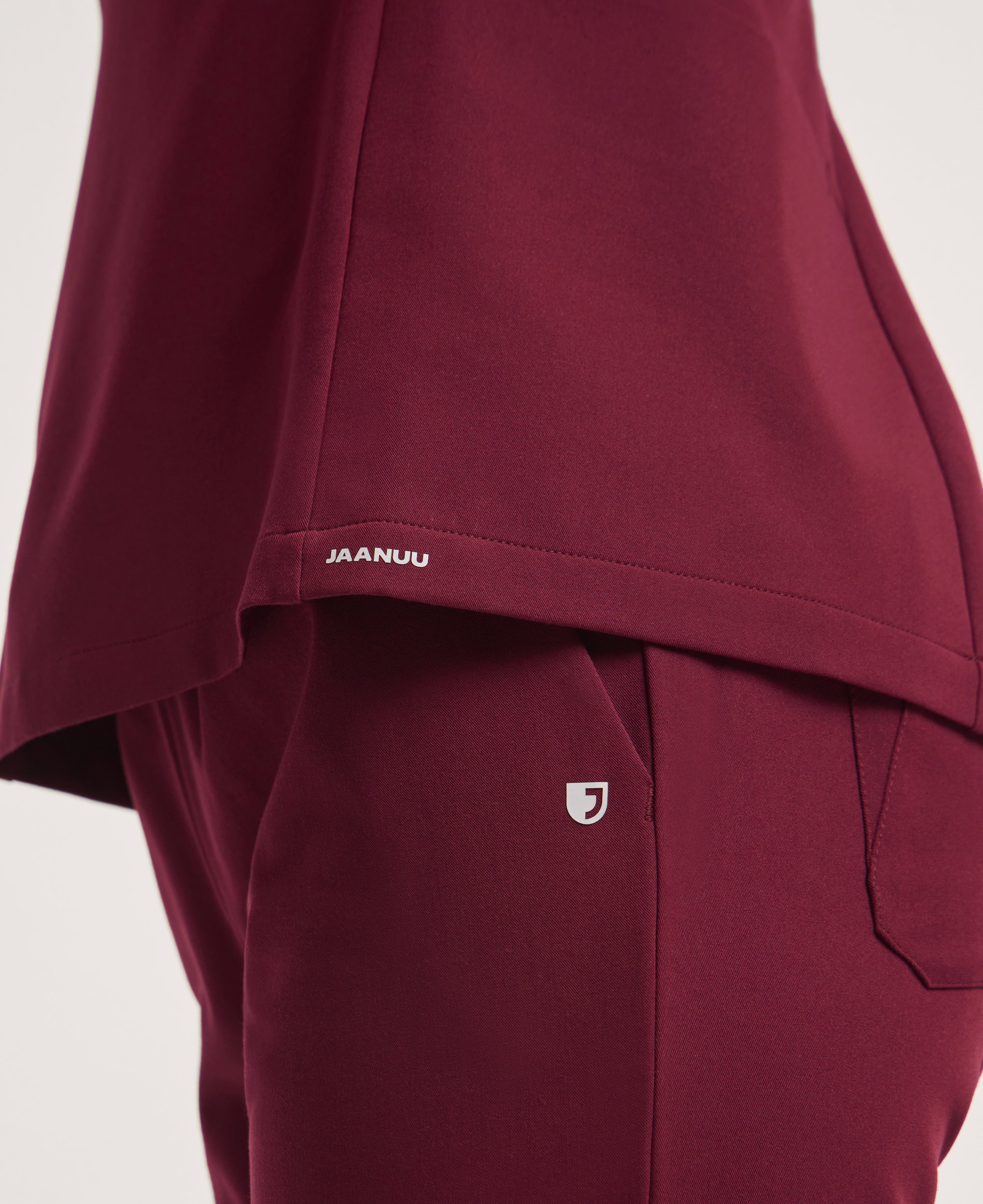 Jaanuu Calix Fit & Flare Scrub Top in Burgundy, product photo 4 of 6