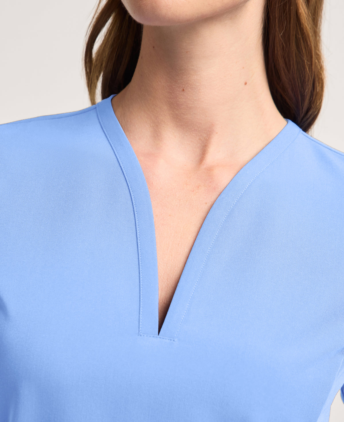 Jaanuu Calix Fit & Flare Scrub Top in Ceil Blue, product photo 2 of 6