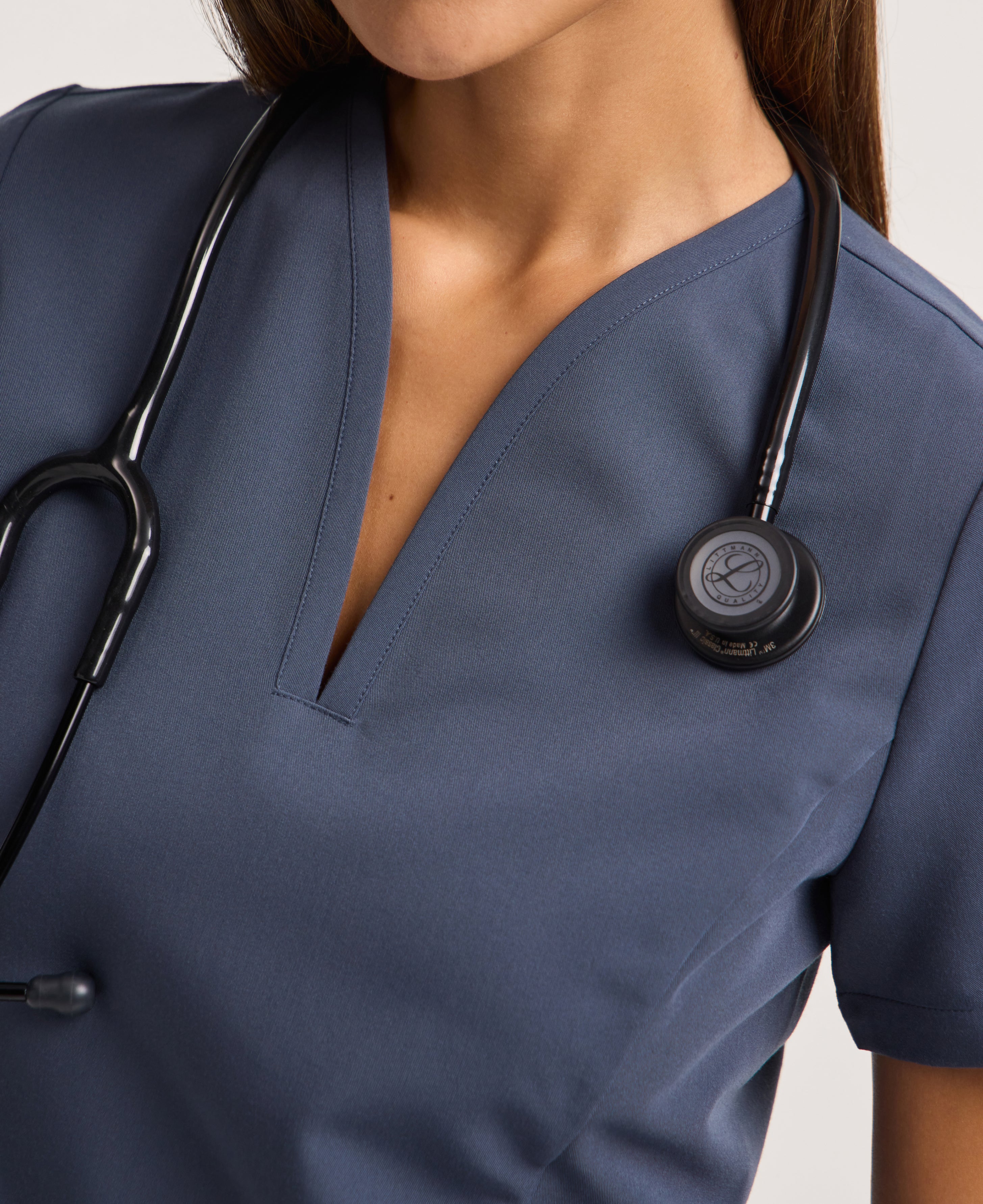 Jaanuu Calix Fit & Flare Scrub Top in Carbon Gray, product photo 4 of 6