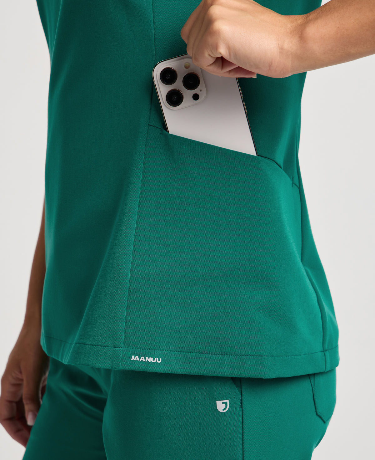 Jaanuu Calix Fit & Flare Scrub Top in Hunter Green, product photo 6 of 6