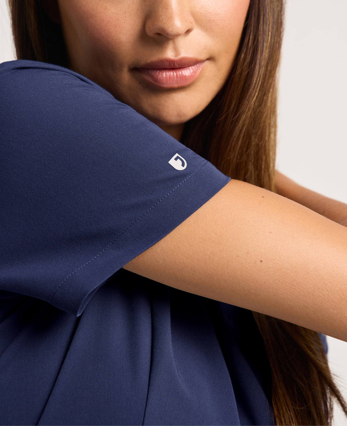 Jaanuu Calix Fit & Flare Scrub Top in Midnight Navy, product photo 3 of 6