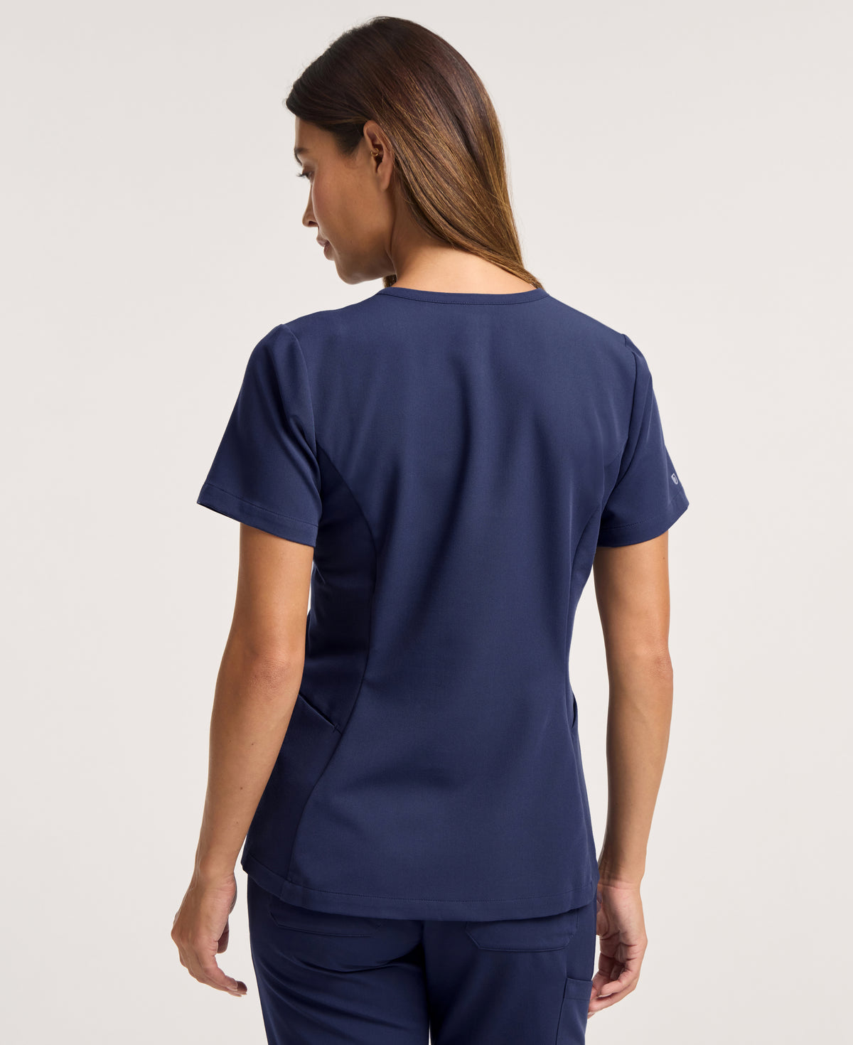 Jaanuu Calix Fit & Flare Scrub Top in Midnight Navy, product photo 5 of 6