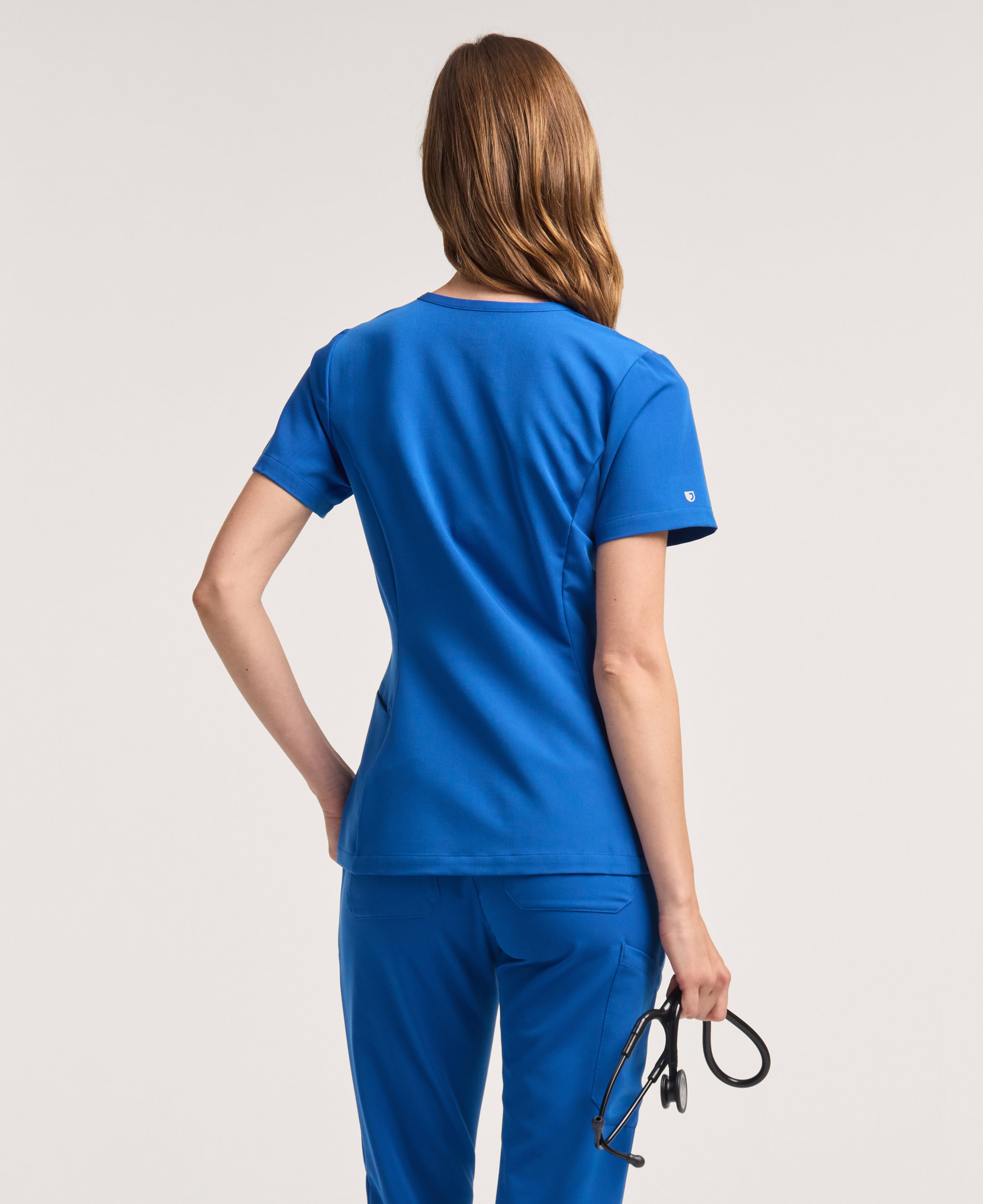 Jaanuu Calix Fit & Flare Scrub Top in Royal Blue, product photo 6 of 6