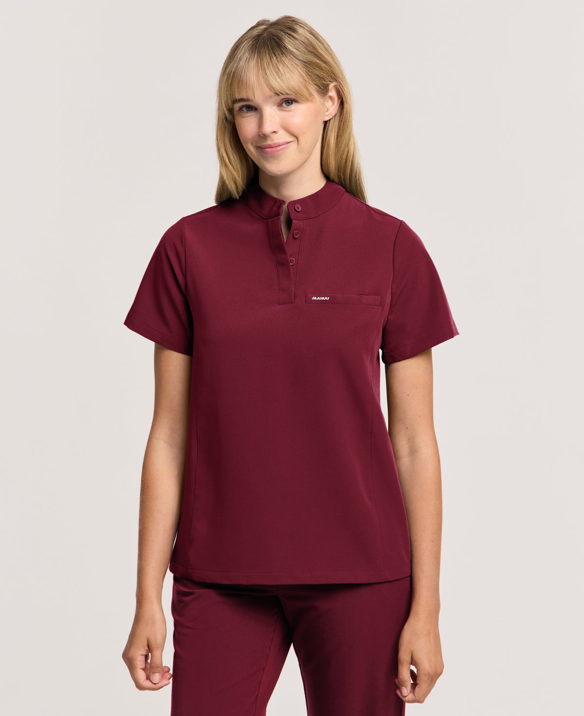 Jaanuu Savi Stand-Collar Scrub Top in Burgundy, product photo 1 of 6