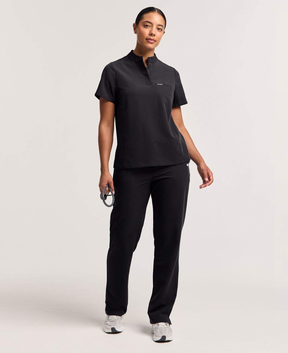 Jaanuu Savi Stand-Collar Scrub Top in Black, product photo 1 of 6