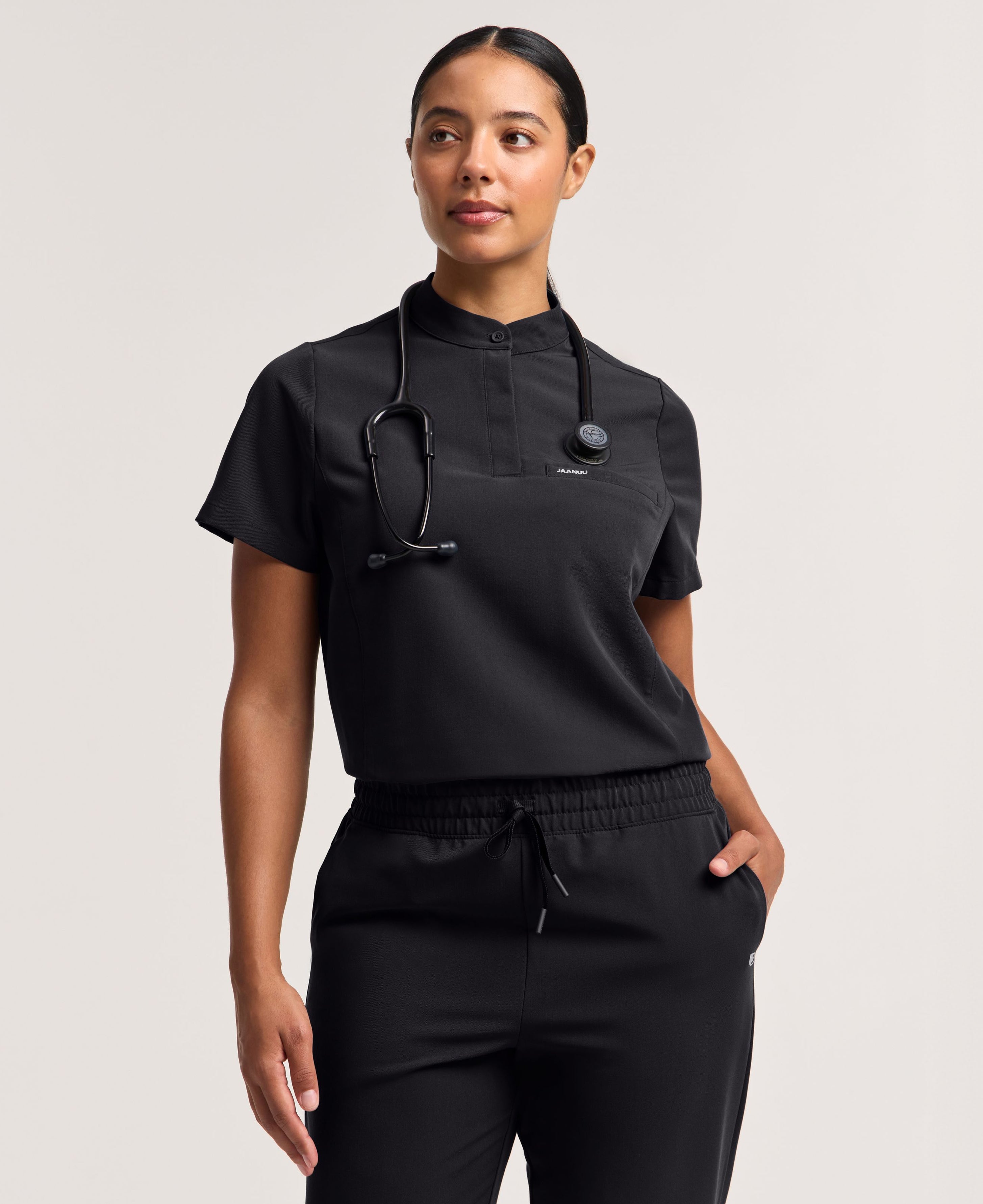 Jaanuu Savi Stand-Collar Scrub Top in Black, product photo 2 of 6