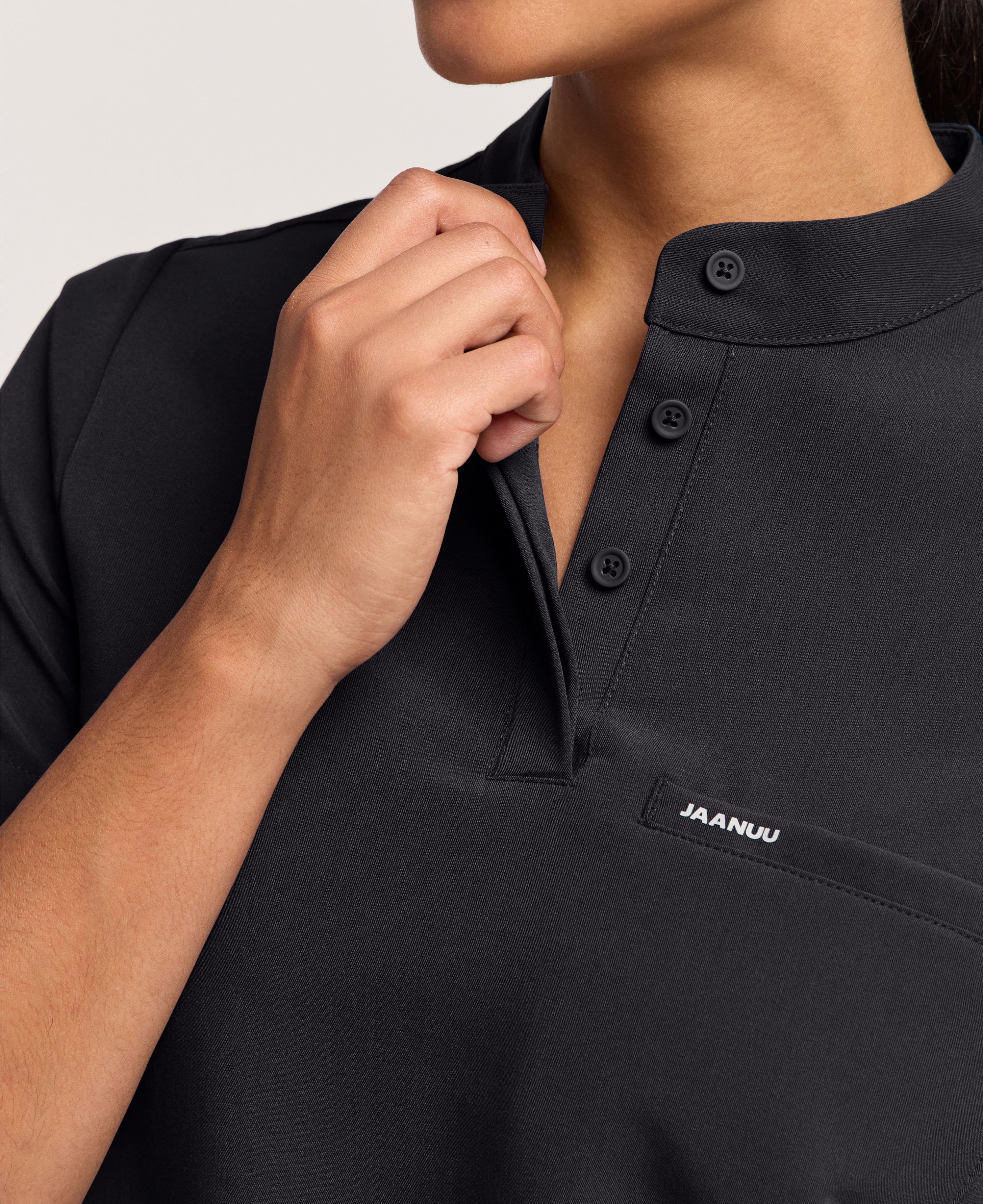Jaanuu Savi Stand-Collar Scrub Top in Black, product photo 4 of 6