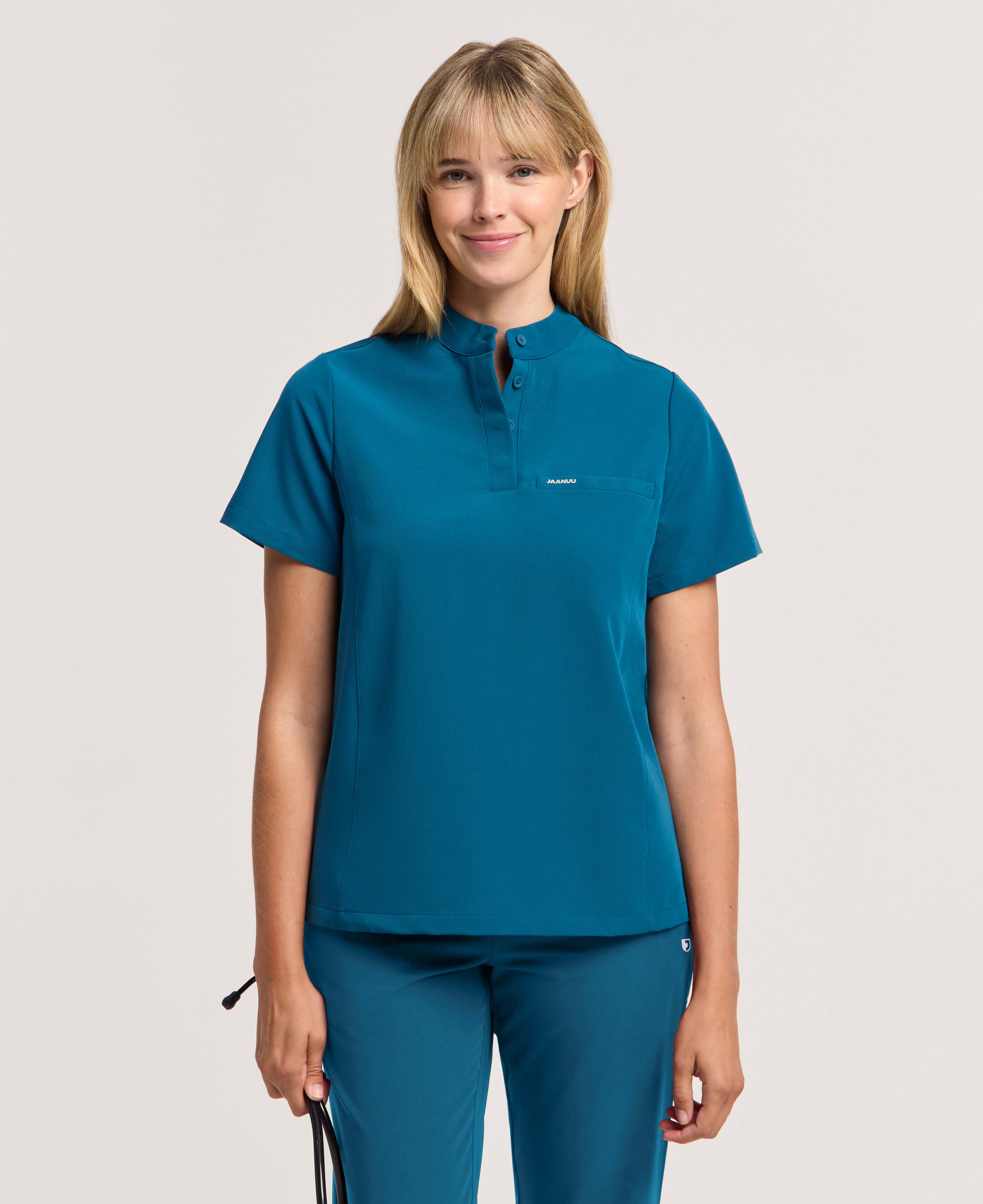 Jaanuu Savi Stand-Collar Scrub Top in Caribbean Blue, product photo 3 of 6