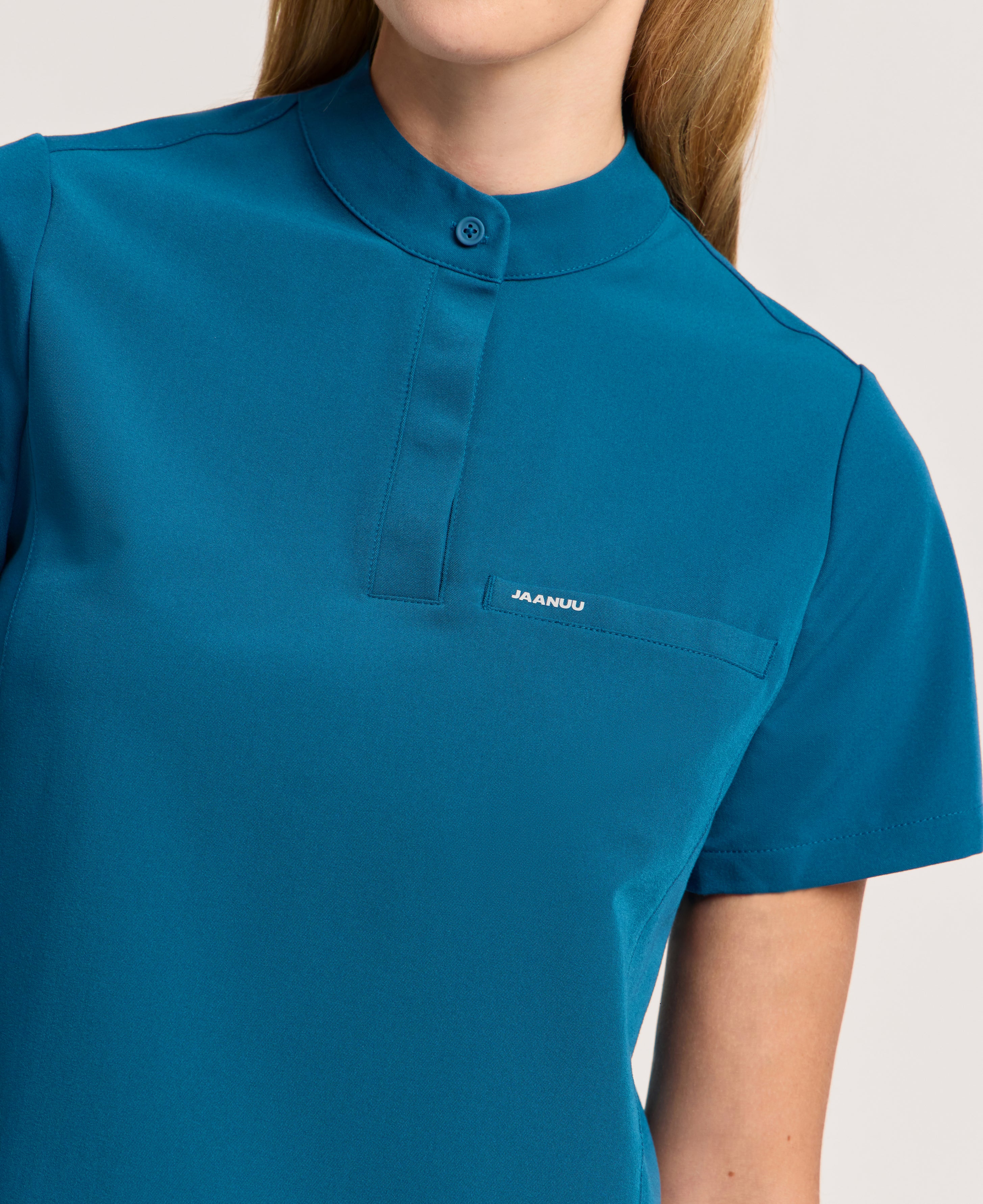 Jaanuu Savi Stand-Collar Scrub Top in Caribbean Blue, product photo 4 of 6