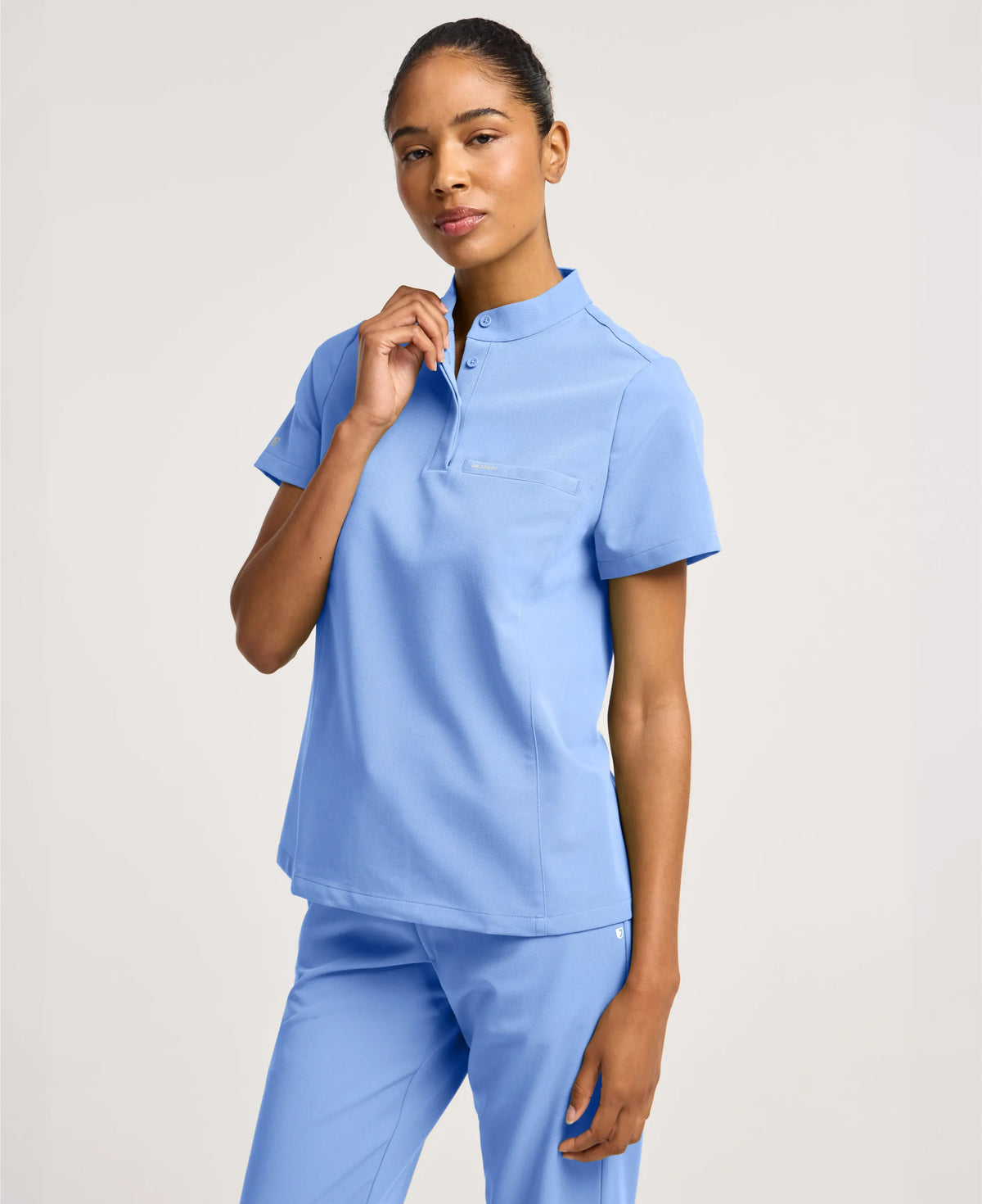 Jaanuu Savi Stand-Collar Scrub Top in Ceil Blue, product photo 1 of 6