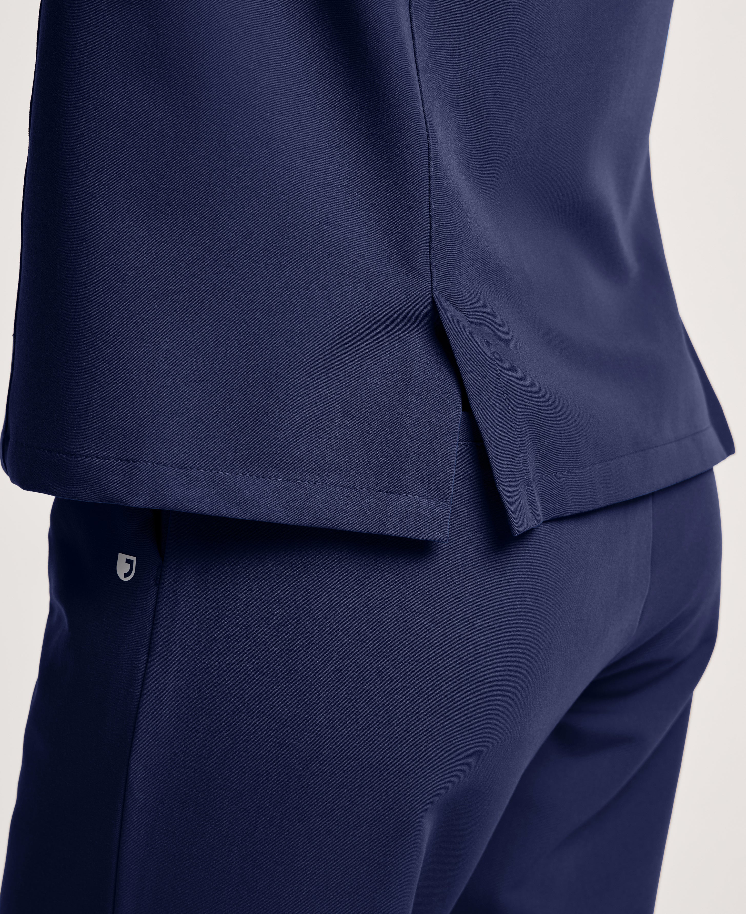 Jaanuu Savi Stand-Collar Scrub Top in Midnight Navy, product photo 4 of 6
