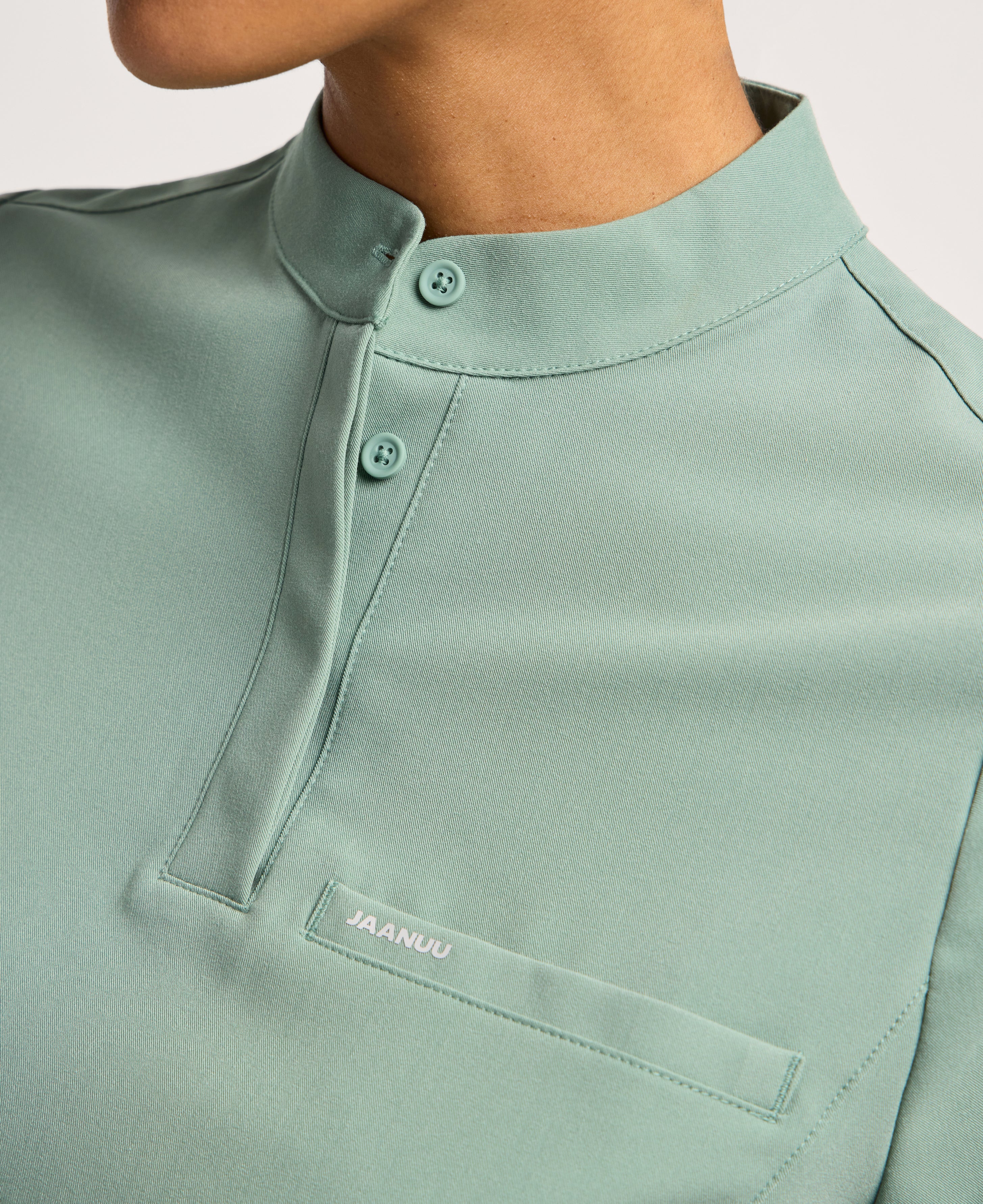 Jaanuu Savi Stand-Collar Scrub Top in Sage, product photo 4 of 6