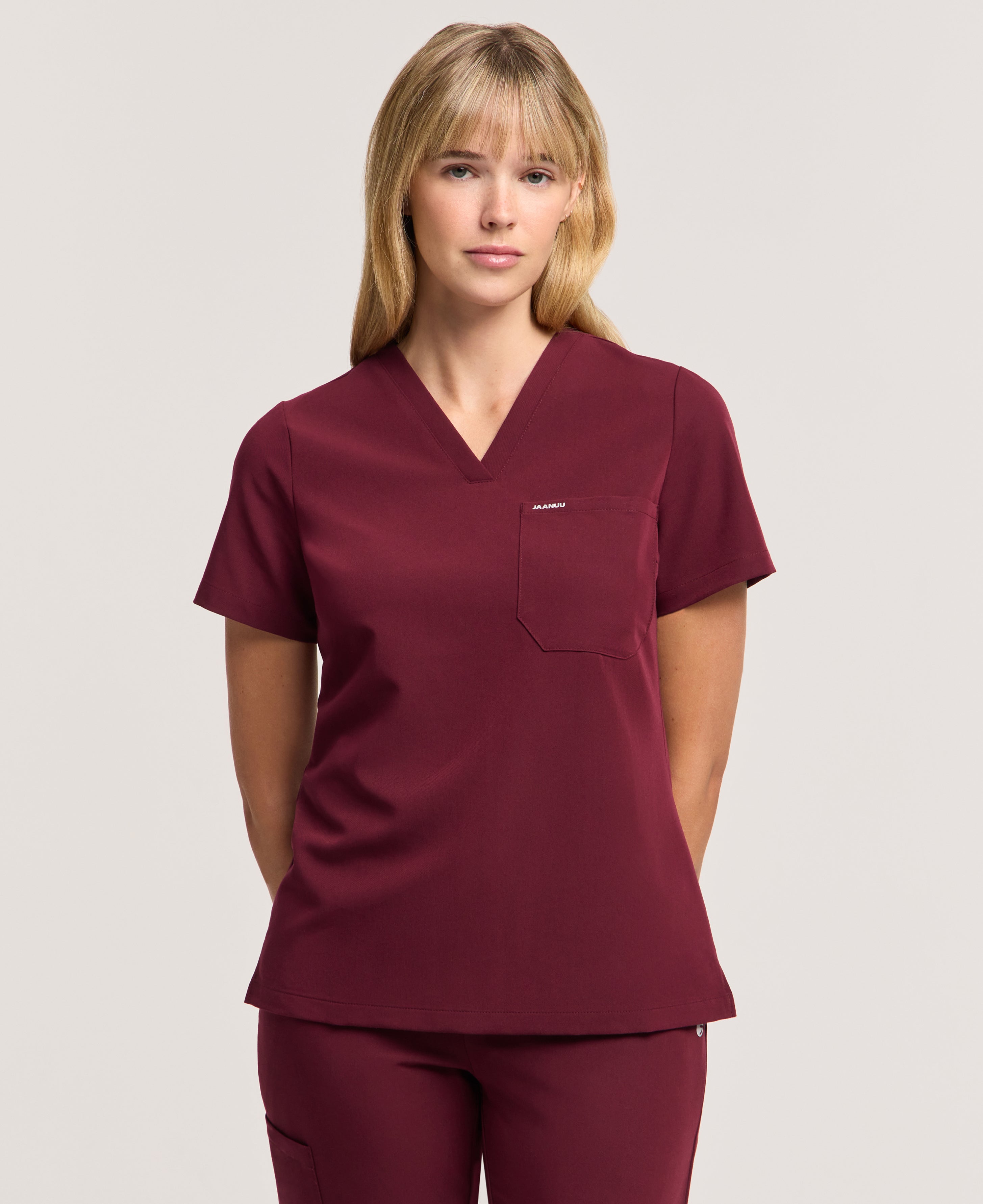 Jaanuu Rhena Slim 1-Pocket Scrub Top in Burgundy, product photo 5 of 6