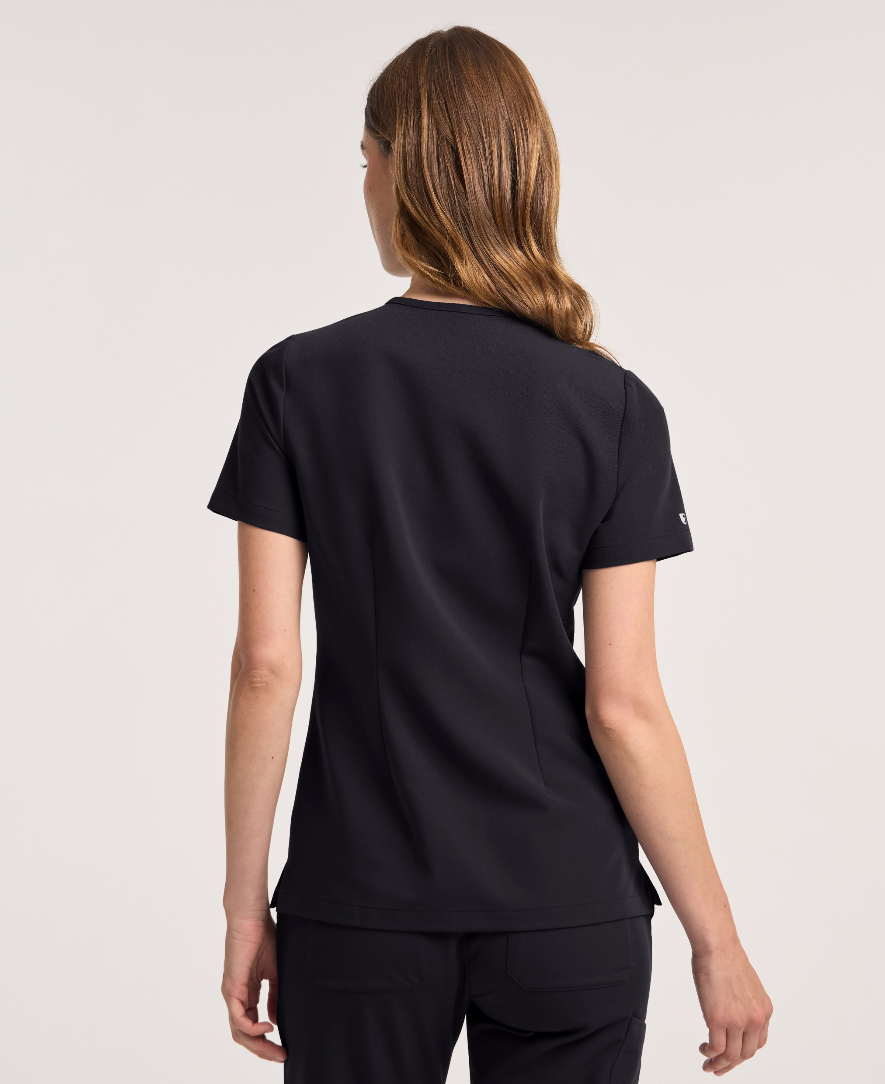 Jaanuu Rhena Slim 1-Pocket Scrub Top in Black, product photo 6 of 6