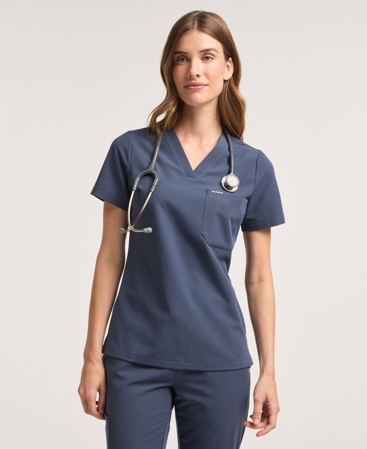 Jaanuu Rhena Slim 1-Pocket Scrub Top in Carbon Gray, product photo 1 of 6