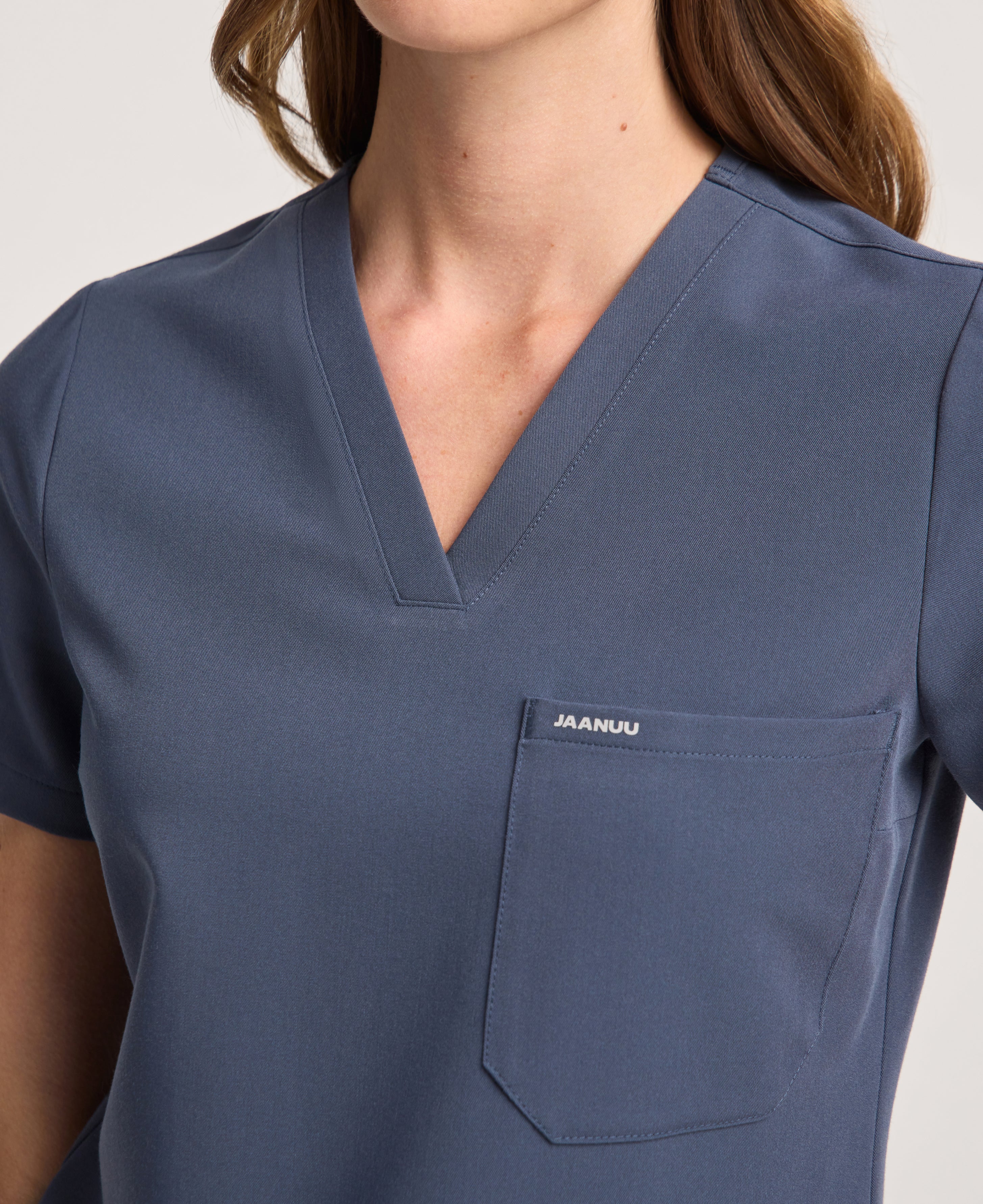 Jaanuu Rhena Slim 1-Pocket Scrub Top in Carbon Gray, product photo 4 of 6