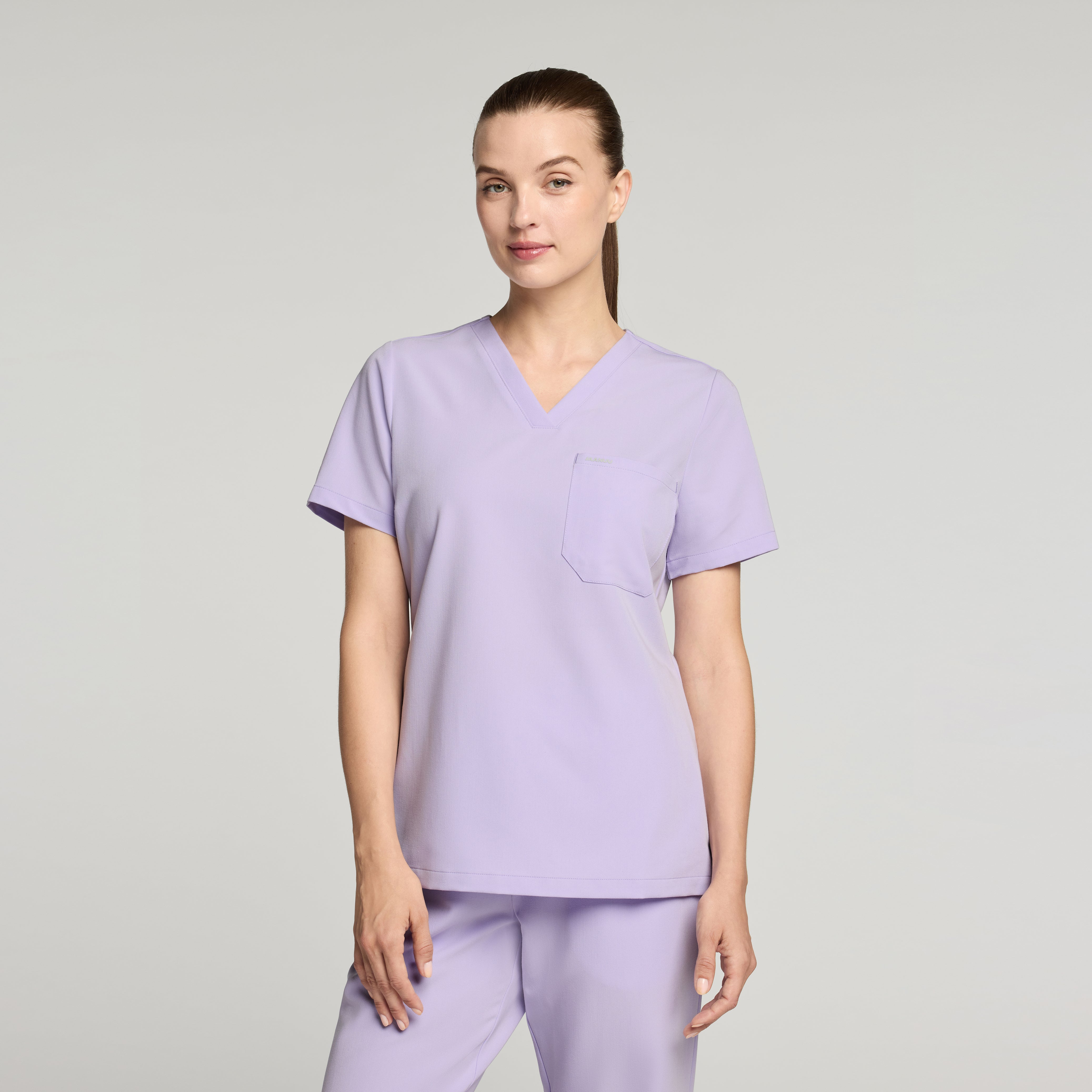 Rhena Slim Essential 1-Pocket Scrub Top - Lavender