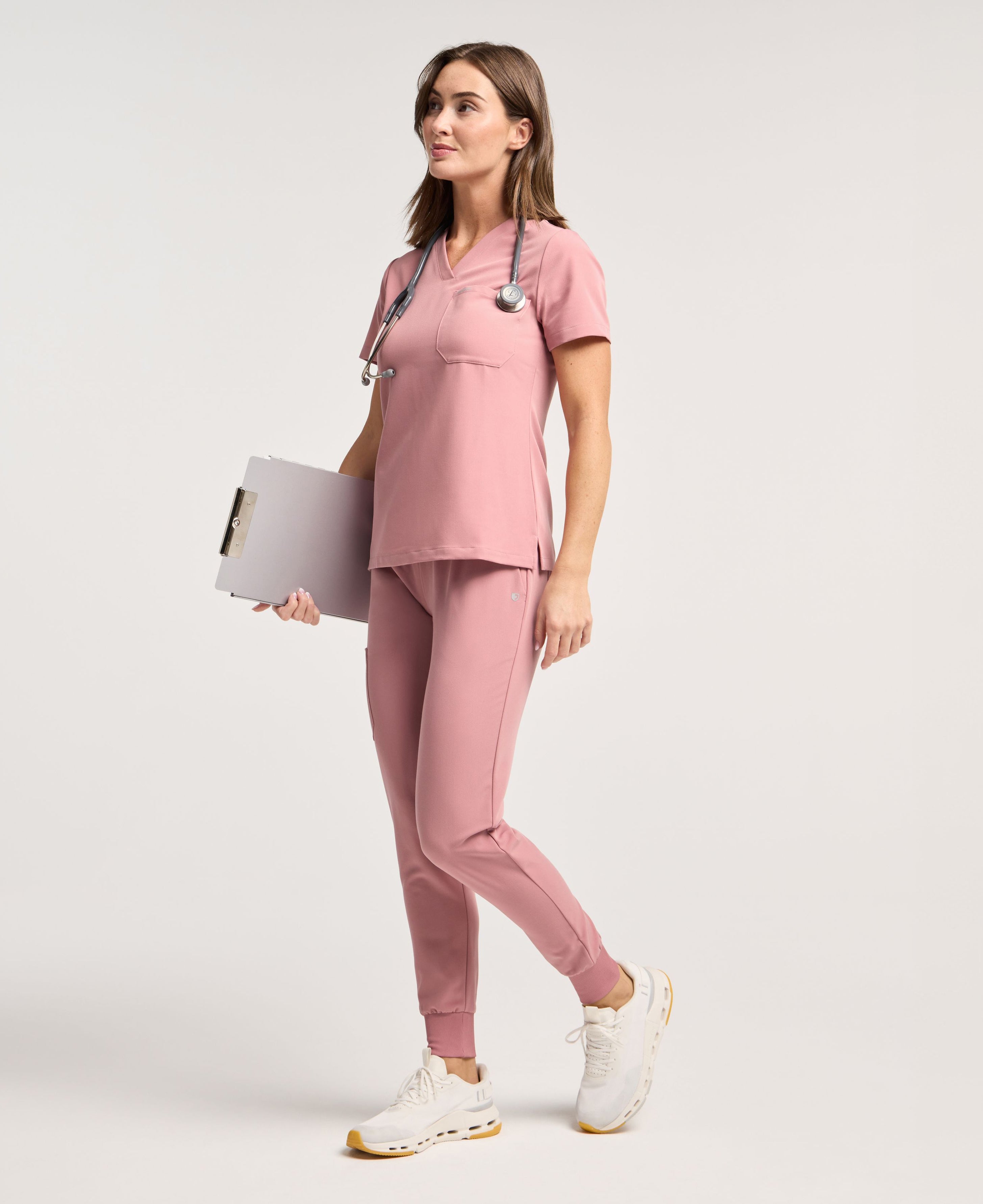 Jaanuu Rhena Slim 1-Pocket Scrub Top in Mauve, product photo 2 of 6