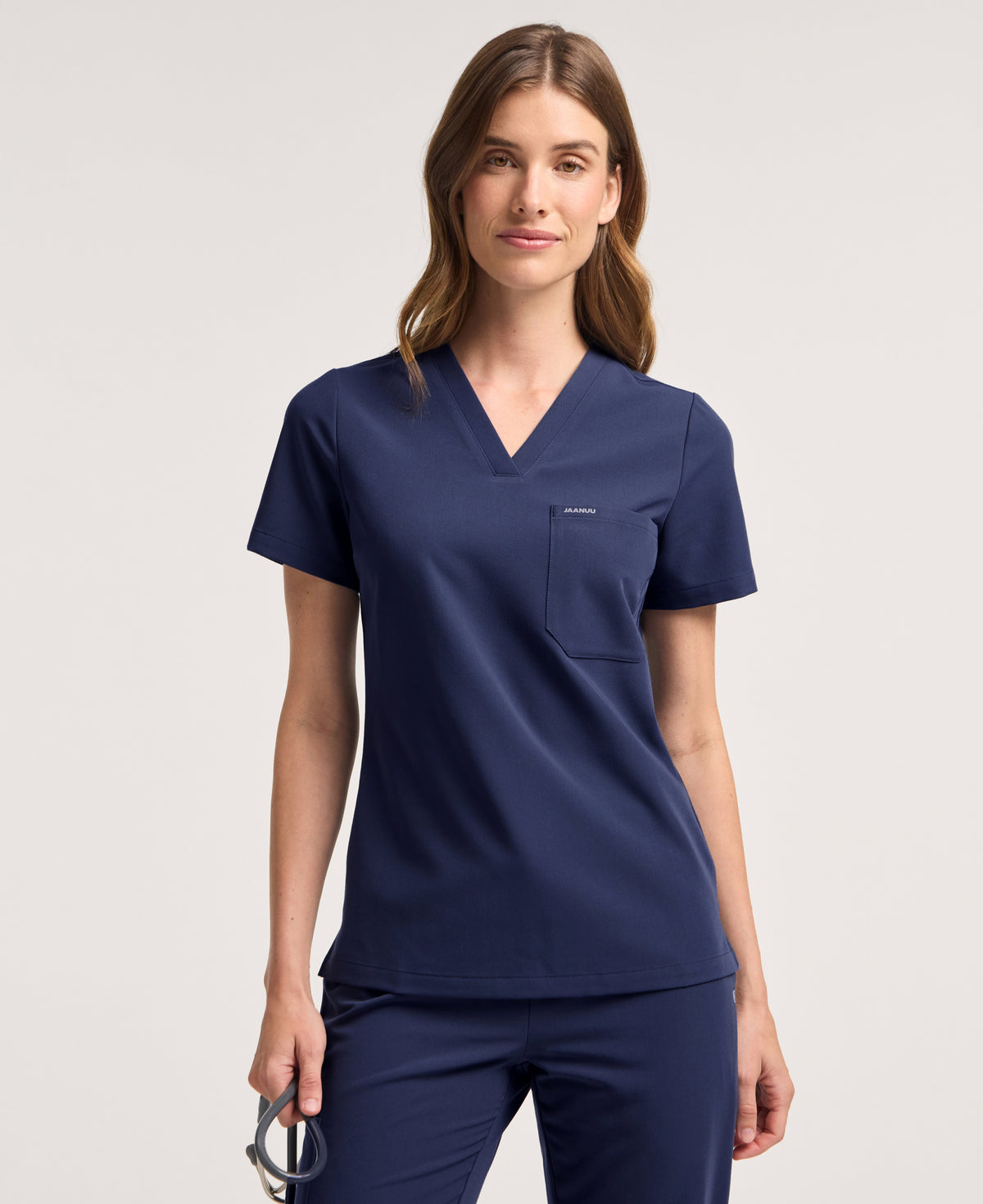 Jaanuu Rhena Slim 1-Pocket Scrub Top in Midnight Navy, product photo 1 of 6