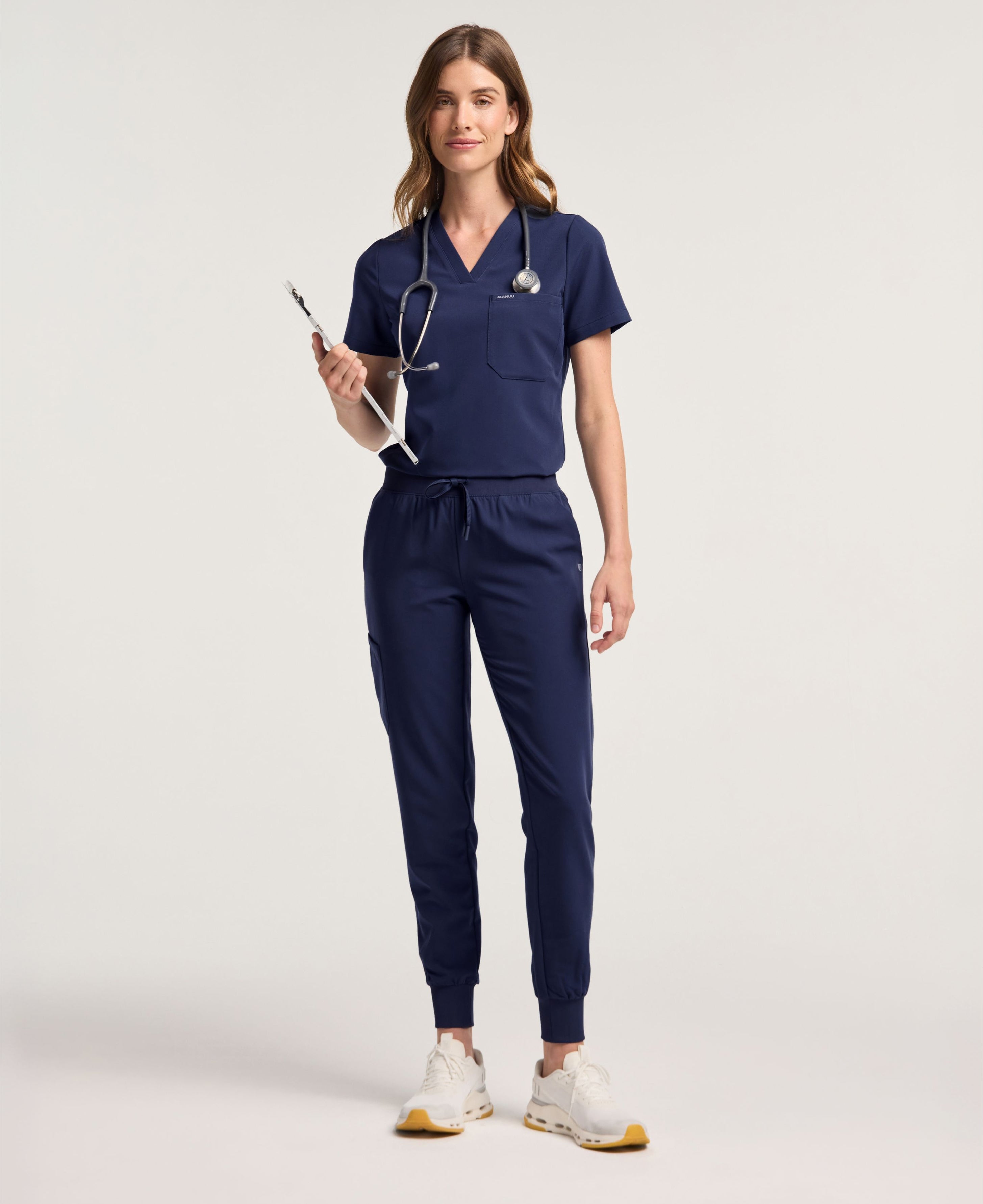 Jaanuu Rhena Slim 1-Pocket Scrub Top in Midnight Navy, product photo 2 of 6