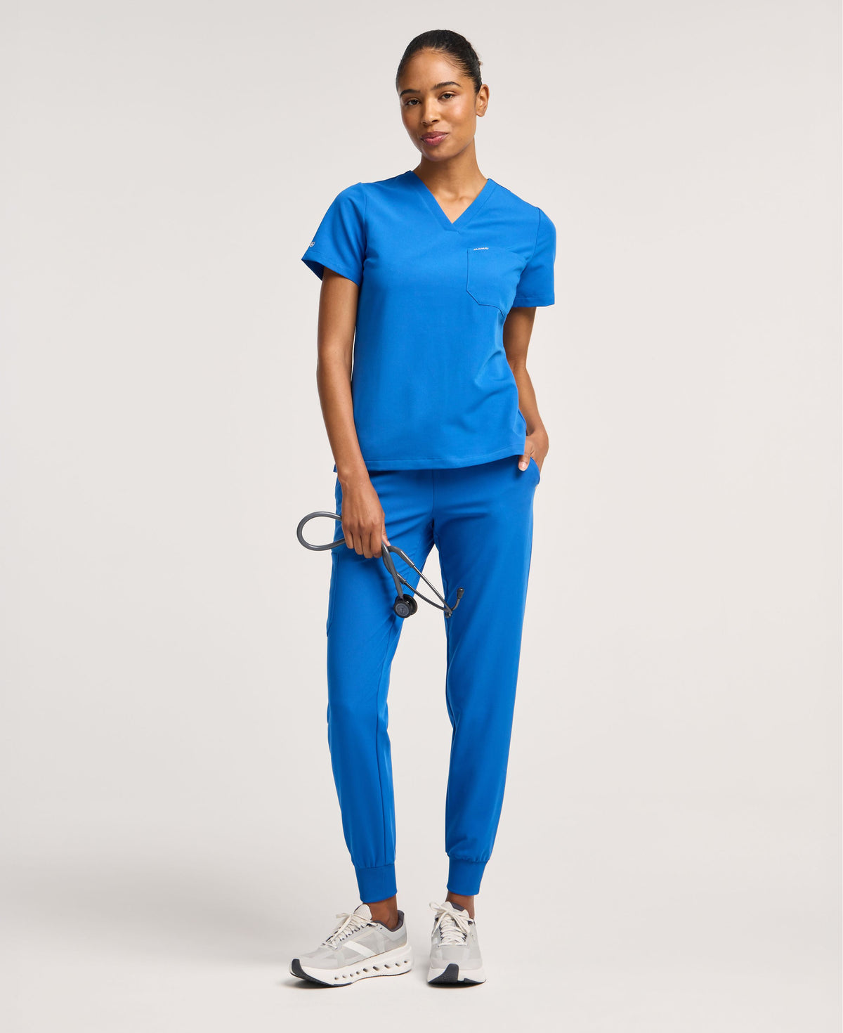 Jaanuu Rhena Slim 1-Pocket Scrub Top in Royal Blue, product photo 2 of 6