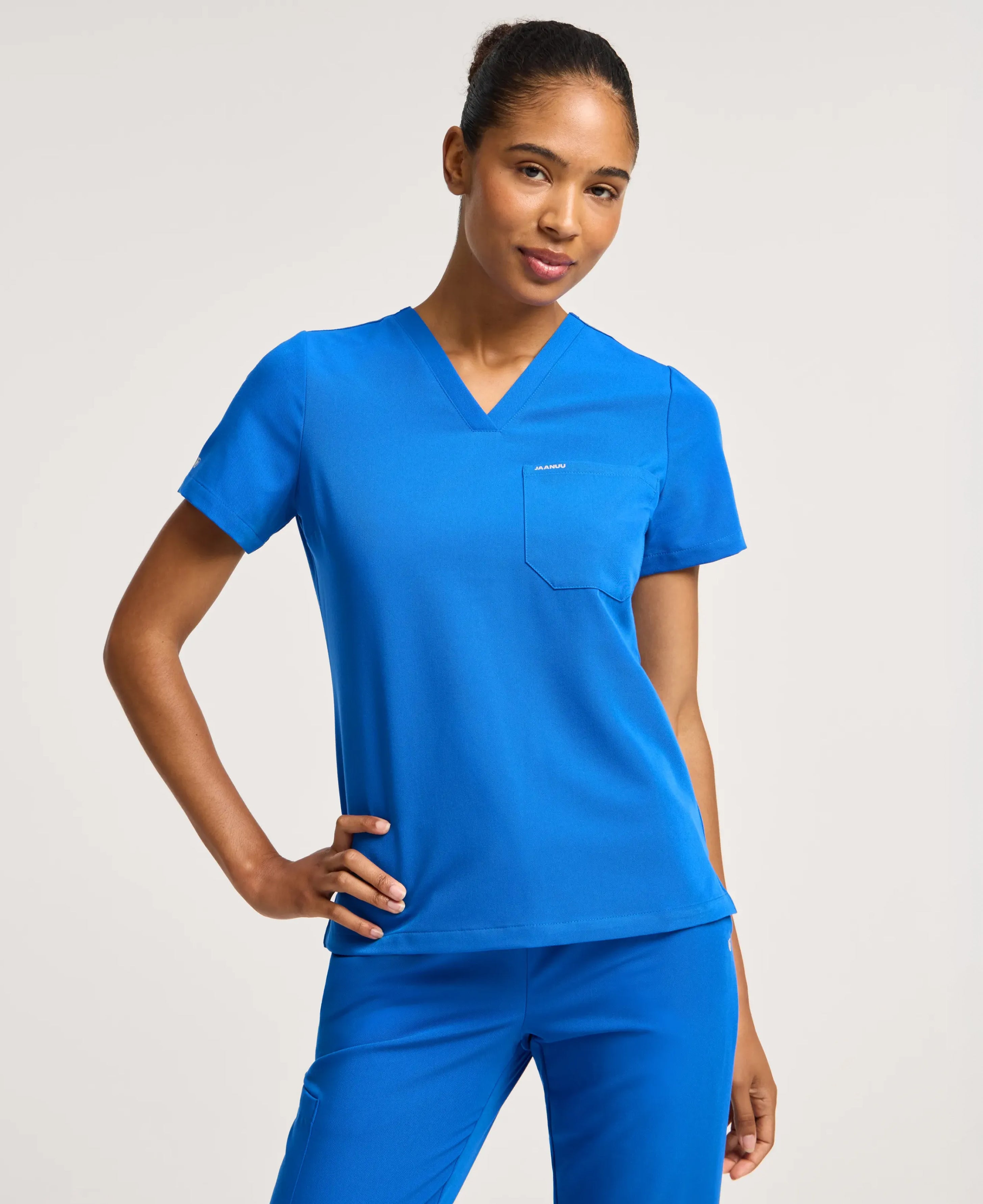 Jaanuu Rhena Slim 1-Pocket Scrub Top in Royal Blue, product photo 4 of 6