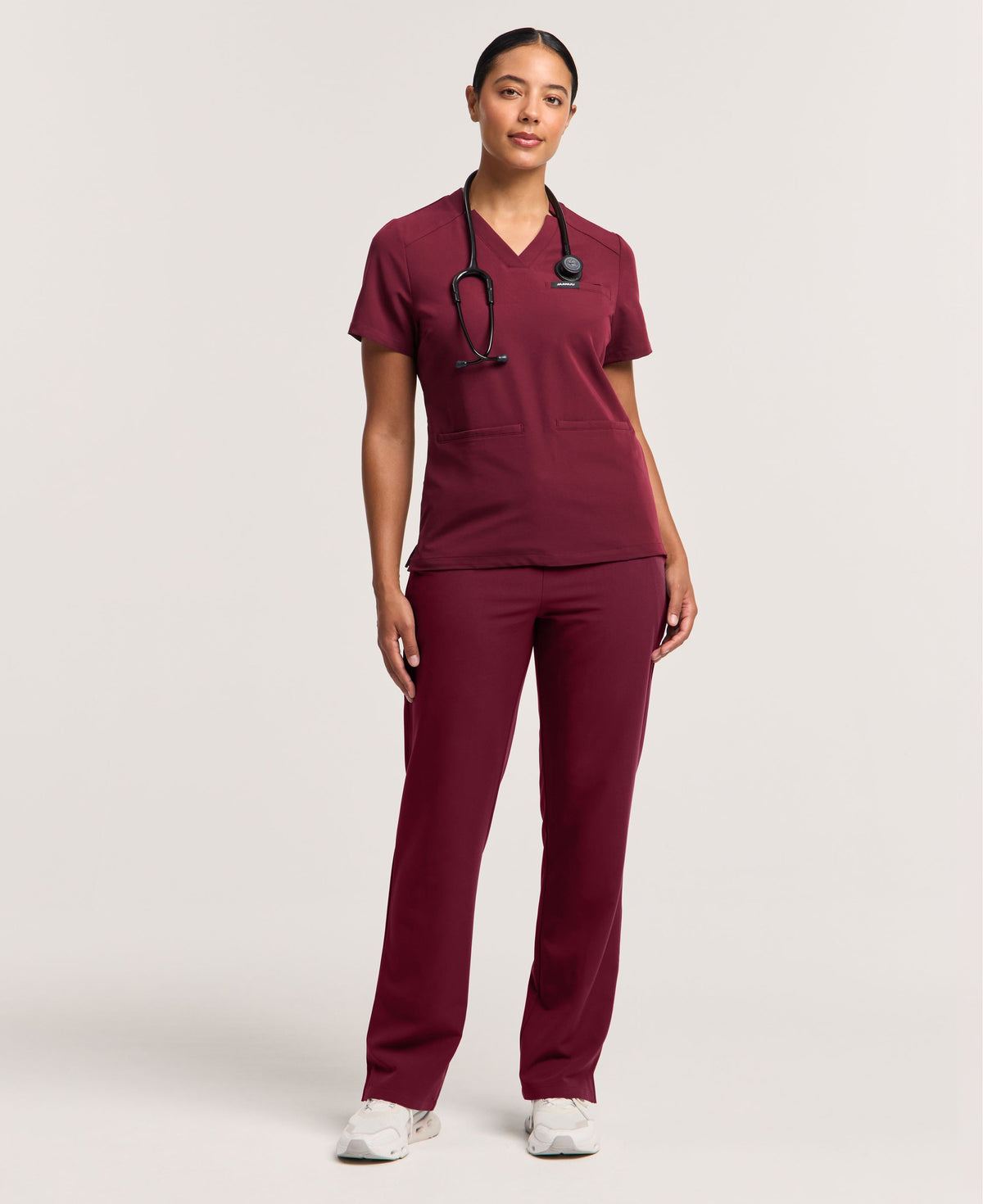 Jaanuu Helia Slim Notched V-Neck Scrub Top in Burgundy, product photo 5 of 6