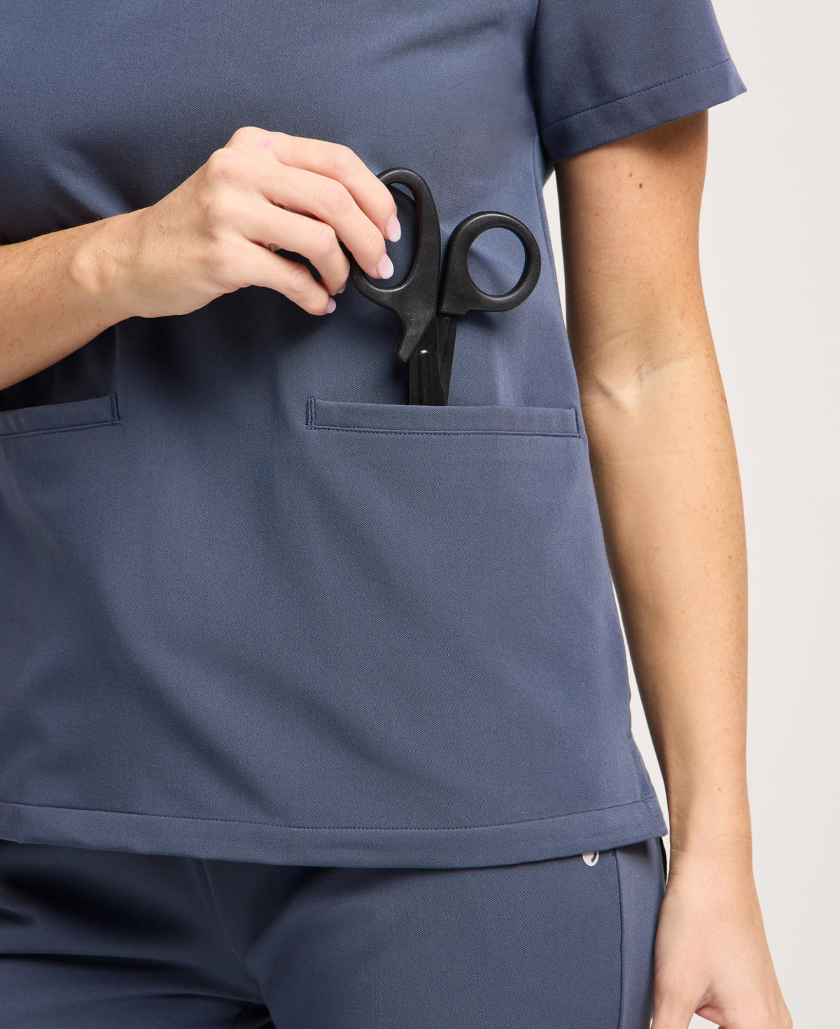 Jaanuu Helia Slim Notched V-Neck Scrub Top in Carbon Gray, product photo 2 of 6