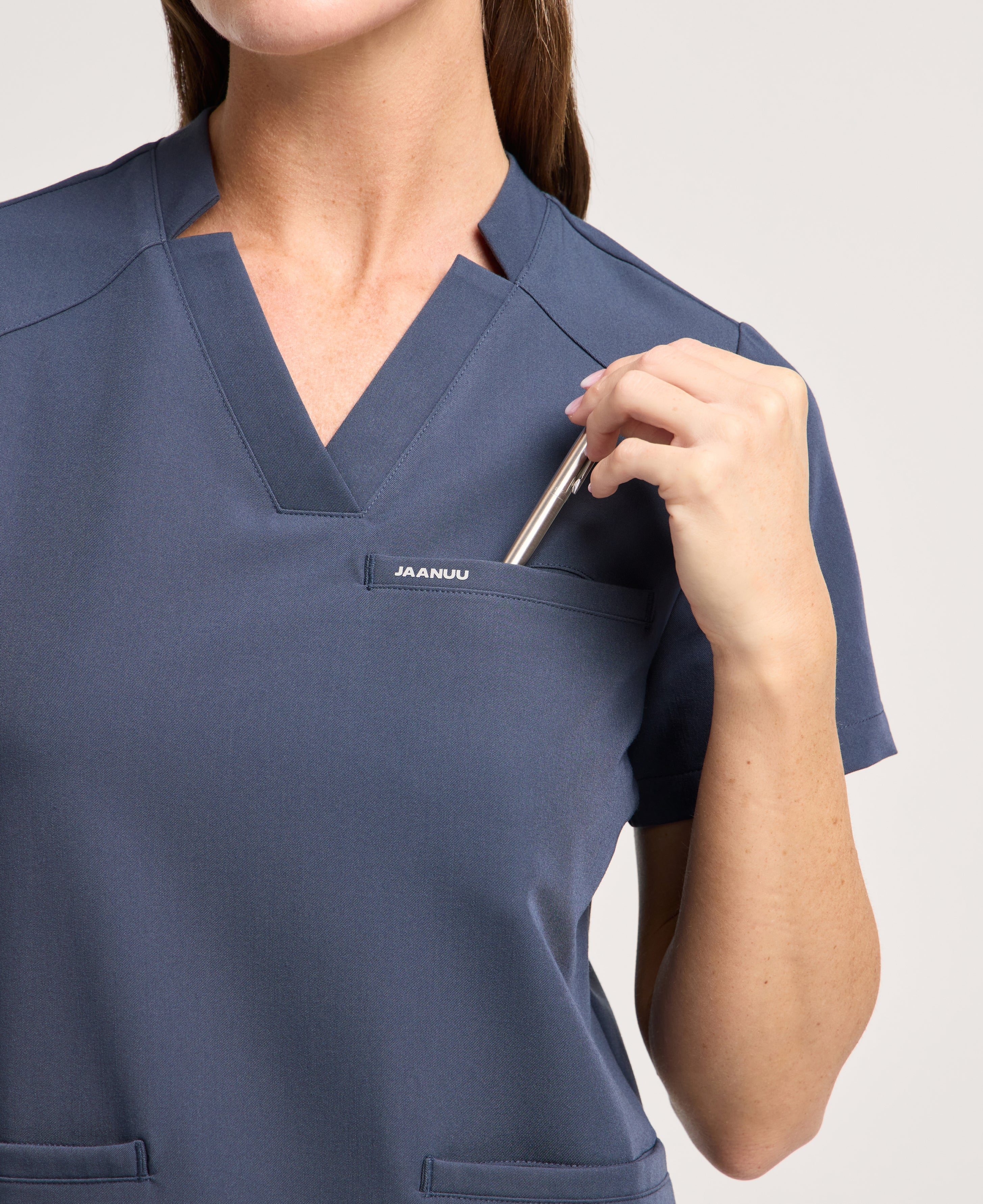 Jaanuu Helia Slim Notched V-Neck Scrub Top in Carbon Gray, product photo 3 of 6