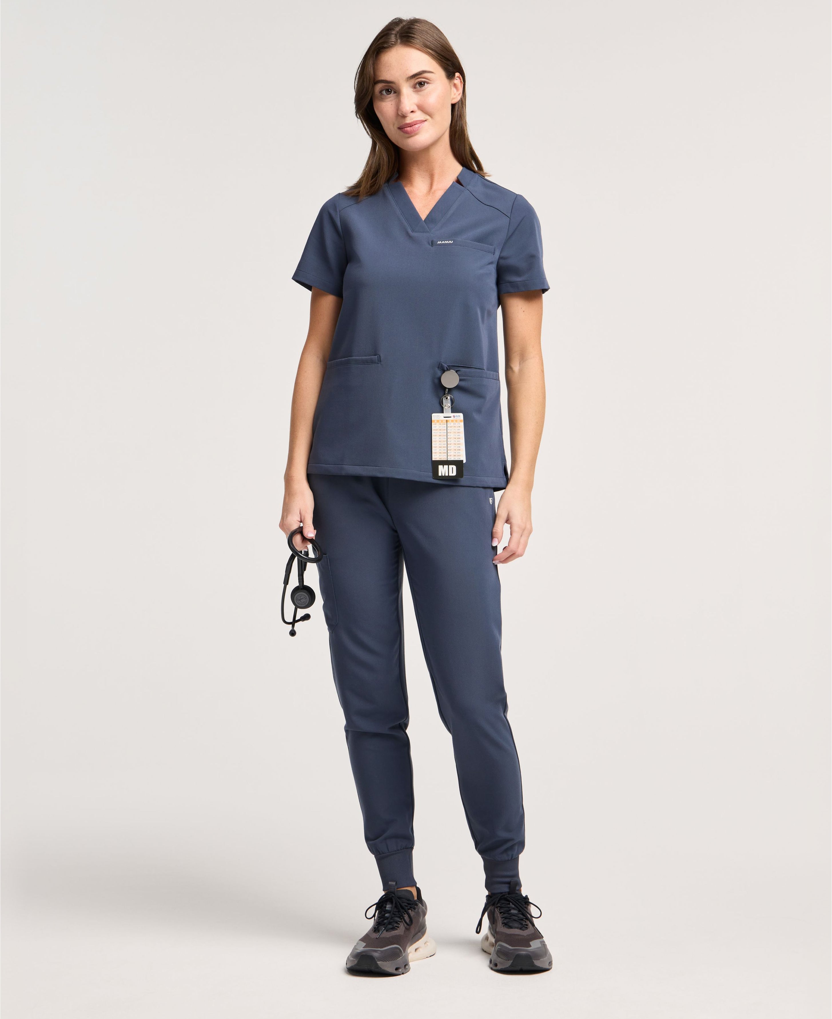 Jaanuu Helia Slim Notched V-Neck Scrub Top in Carbon Gray, product photo 4 of 6