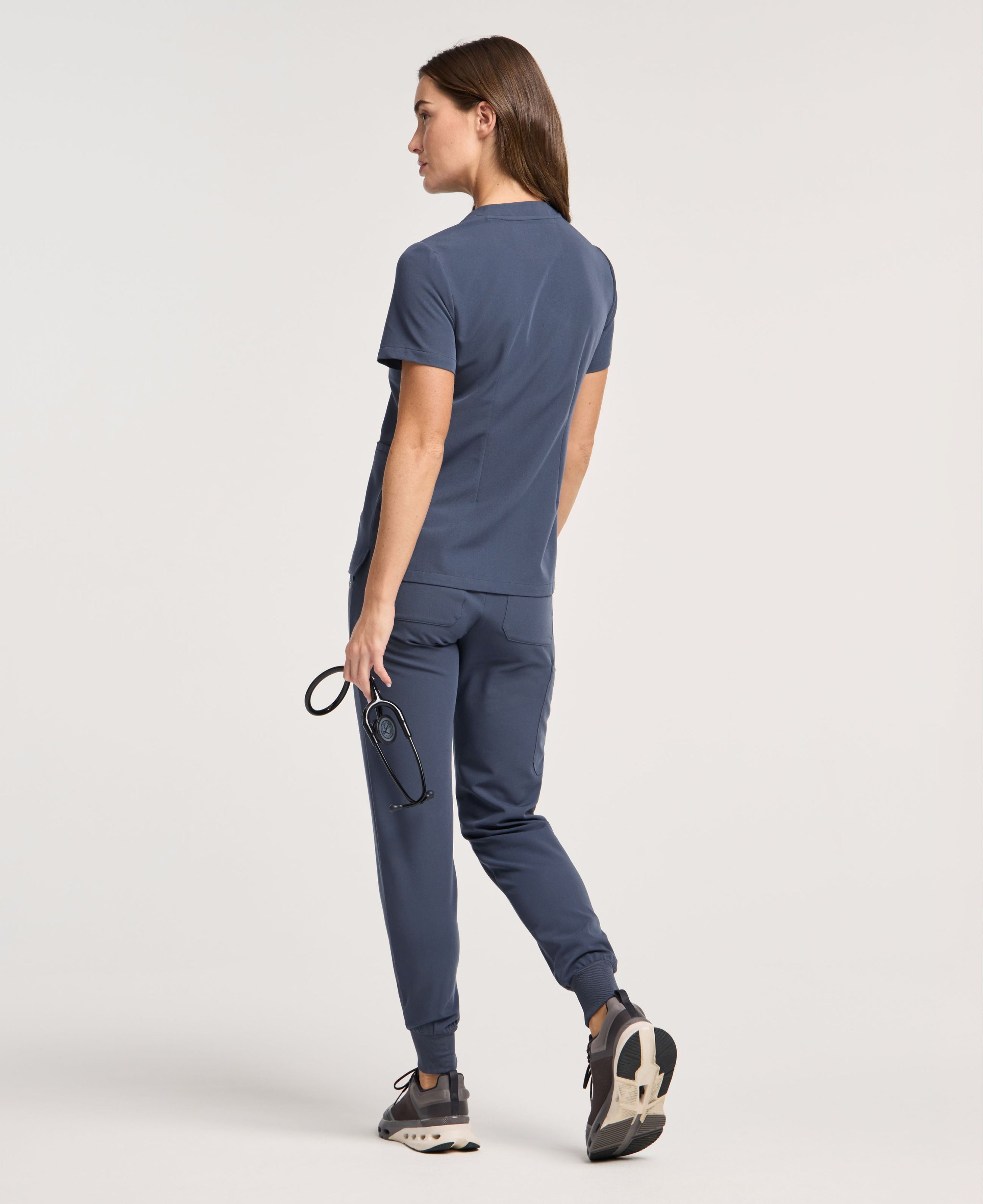 Jaanuu Helia Slim Notched V-Neck Scrub Top in Carbon Gray, product photo 5 of 6