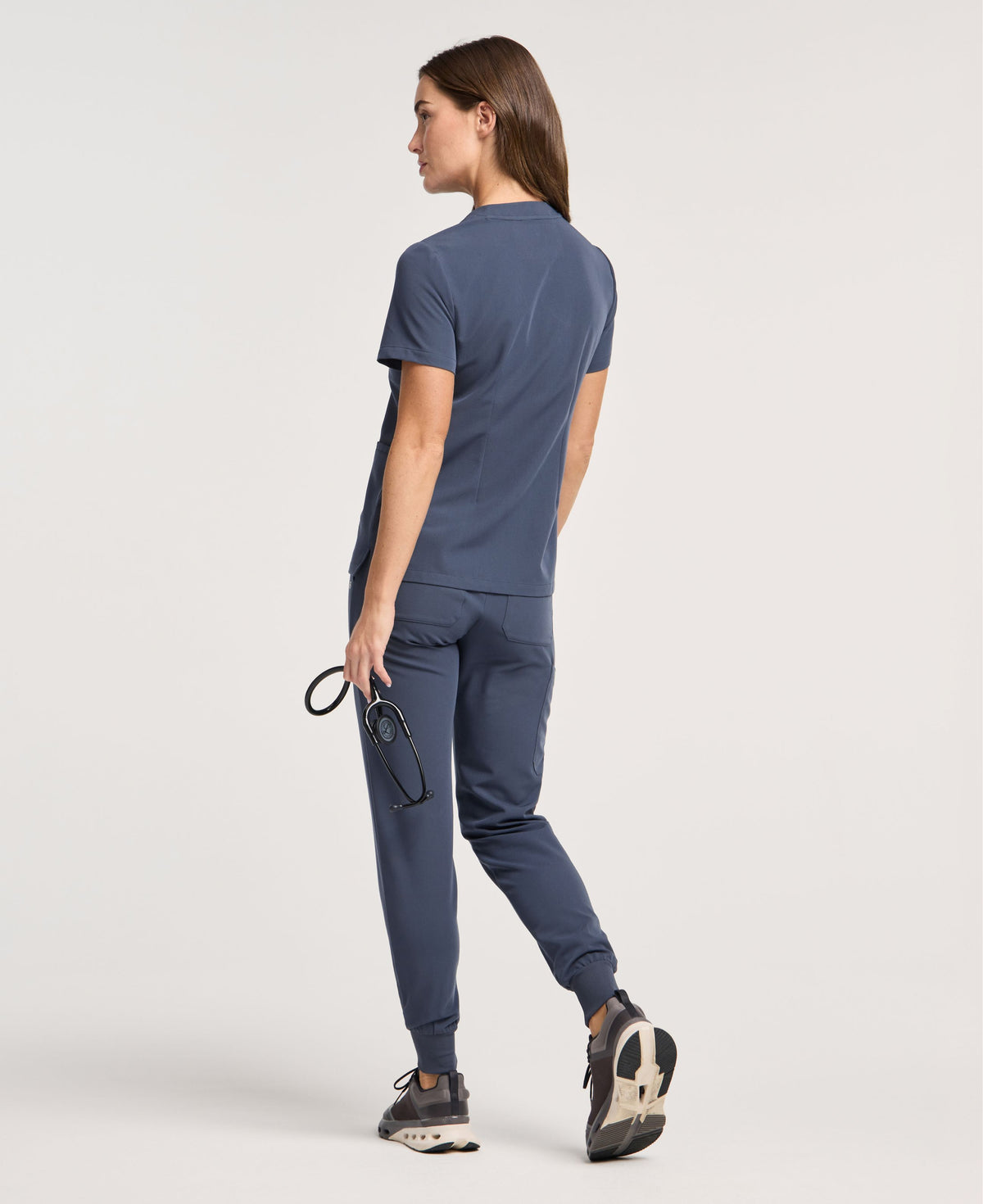Jaanuu Helia Slim Notched V-Neck Scrub Top in Carbon Gray, product photo 5 of 6