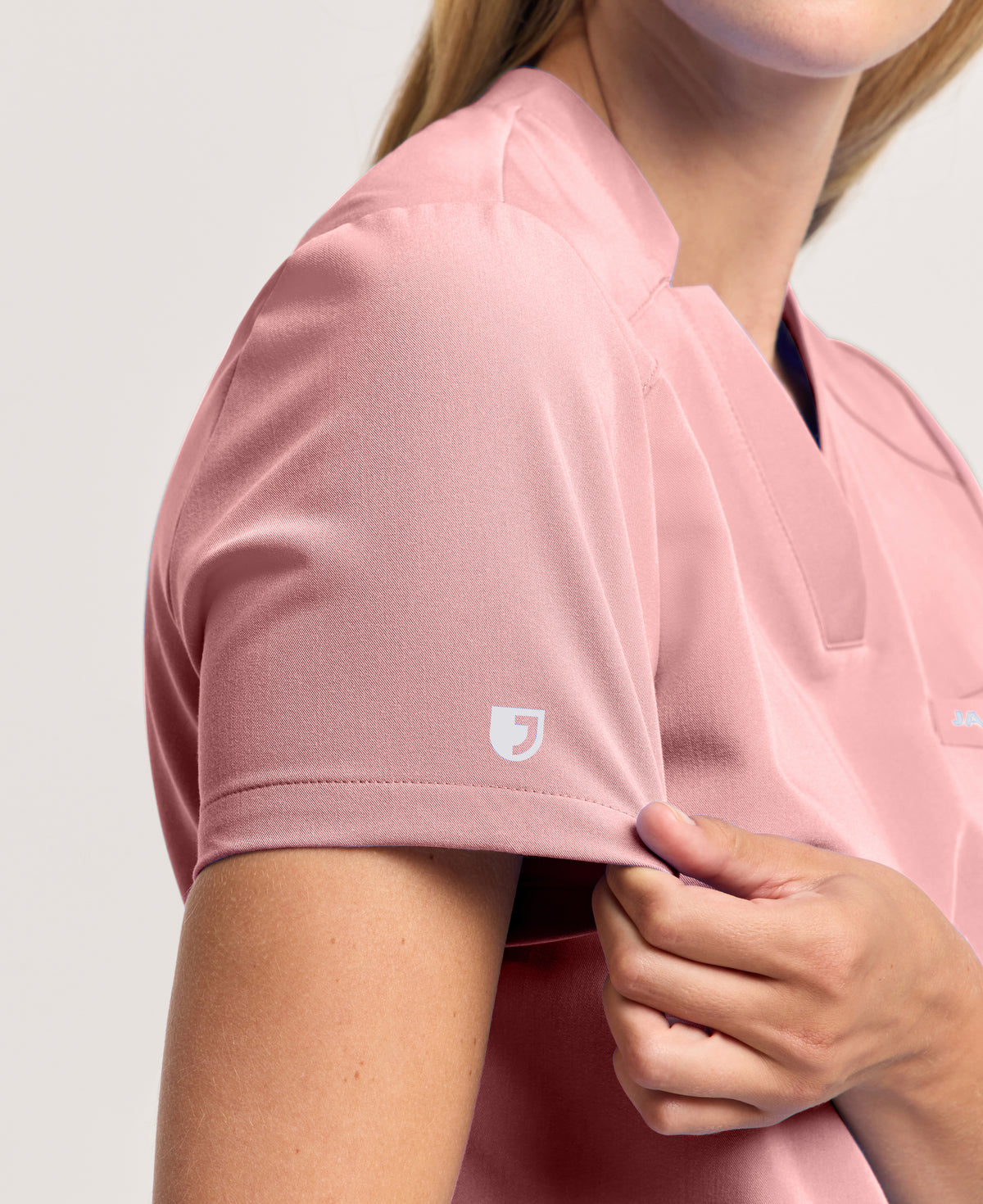 Jaanuu Helia Slim Notched V-Neck Scrub Top in Mauve, product photo 3 of 6