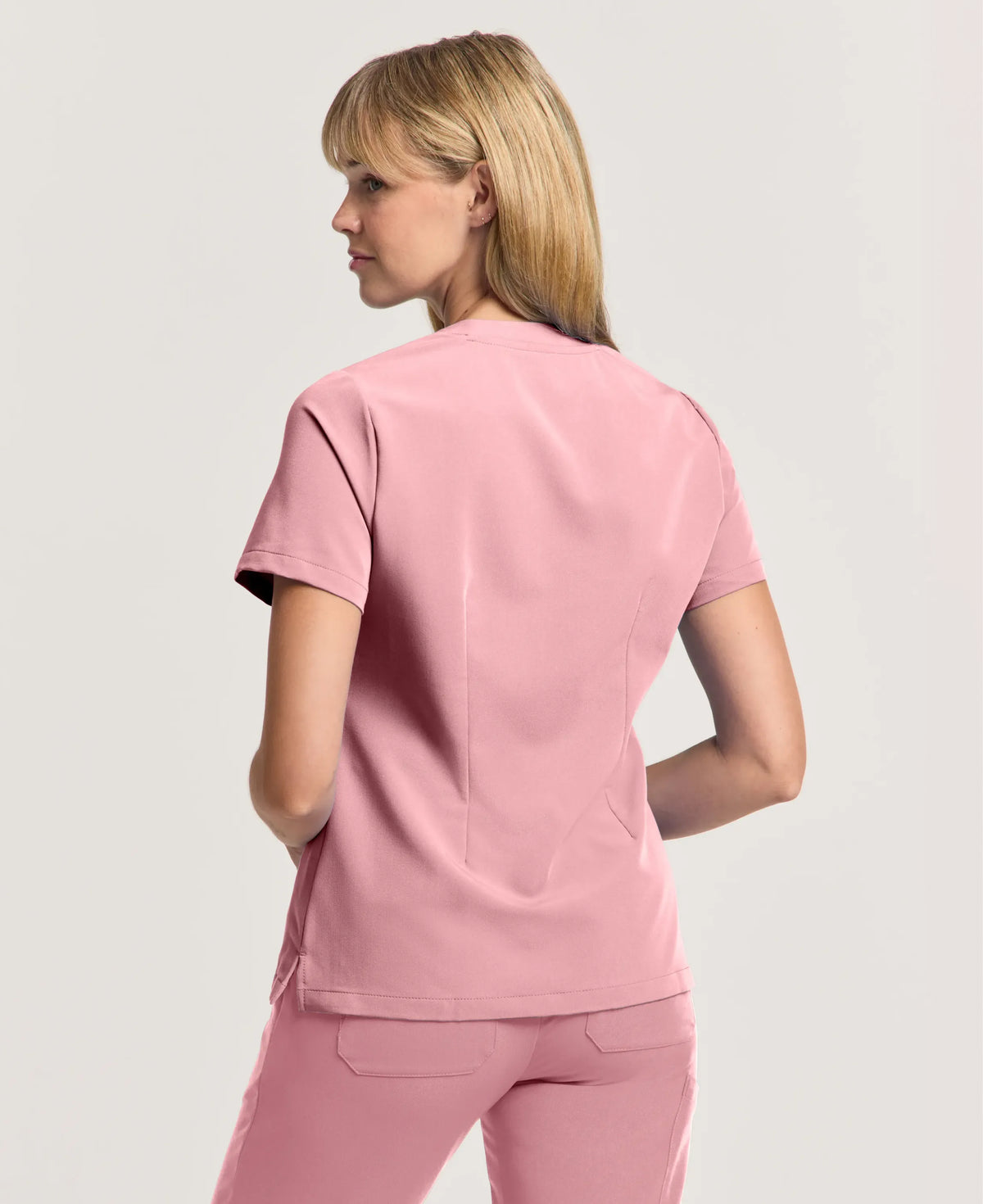 Jaanuu Helia Slim Notched V-Neck Scrub Top in Mauve, product photo 4 of 6