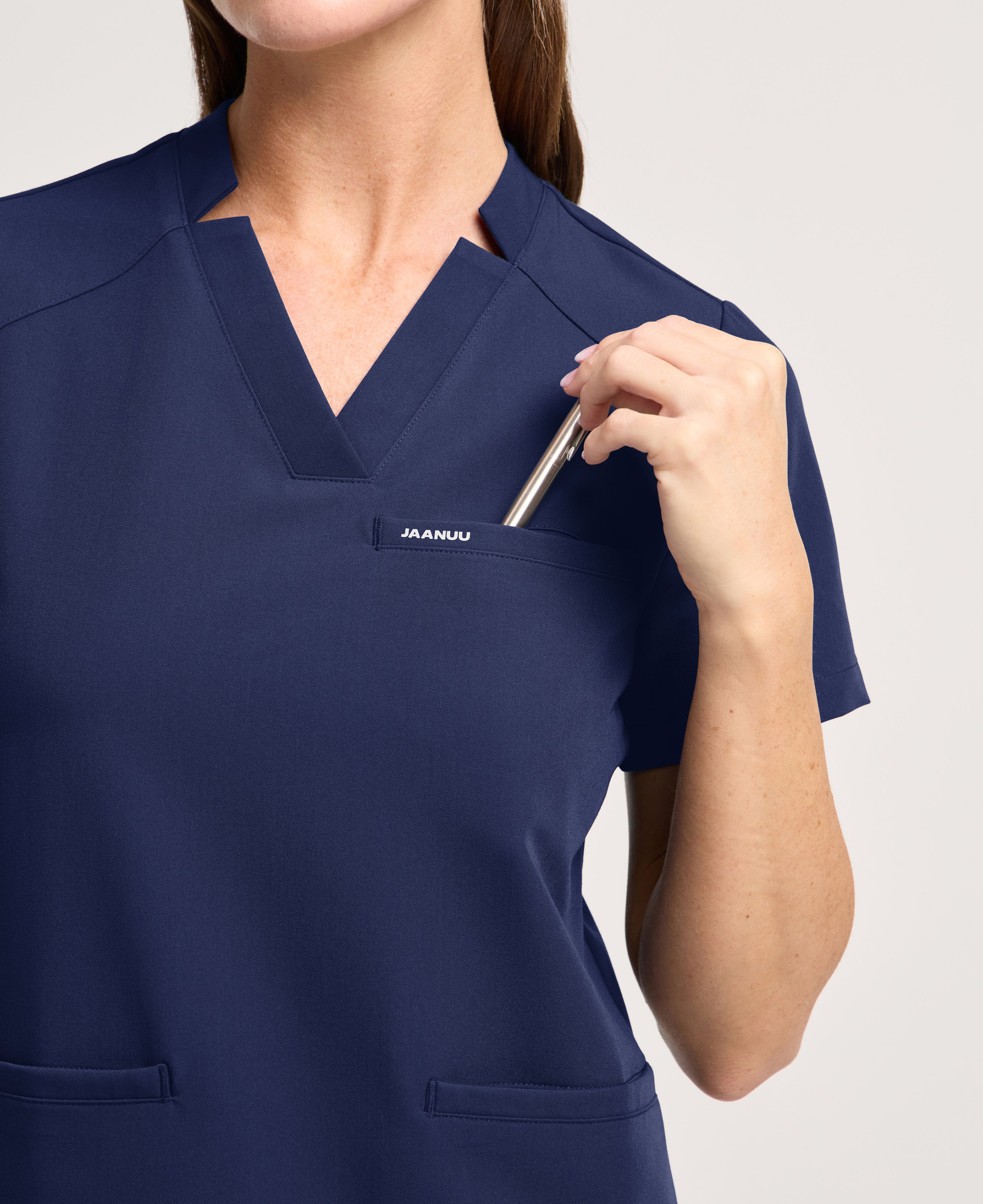 Jaanuu Helia Slim Notched V-Neck Scrub Top in Midnight Navy, product photo 2 of 6