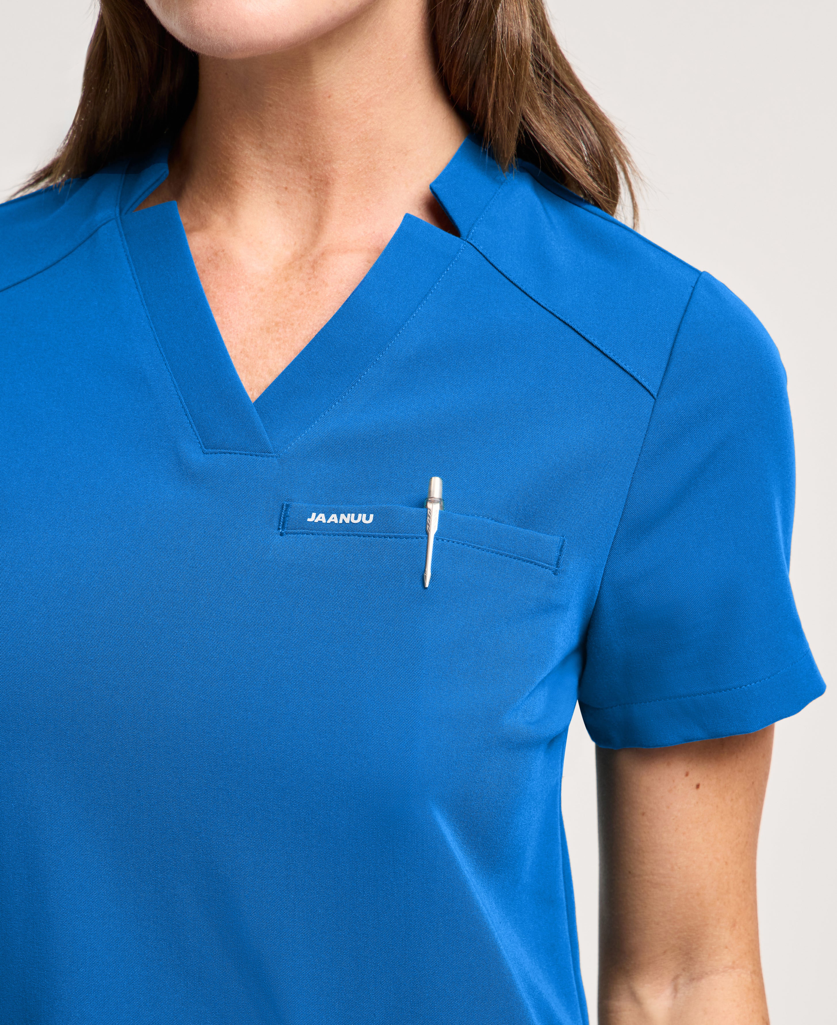 Jaanuu Helia Slim Notched V-Neck Scrub Top in Royal Blue, product photo 2 of 6