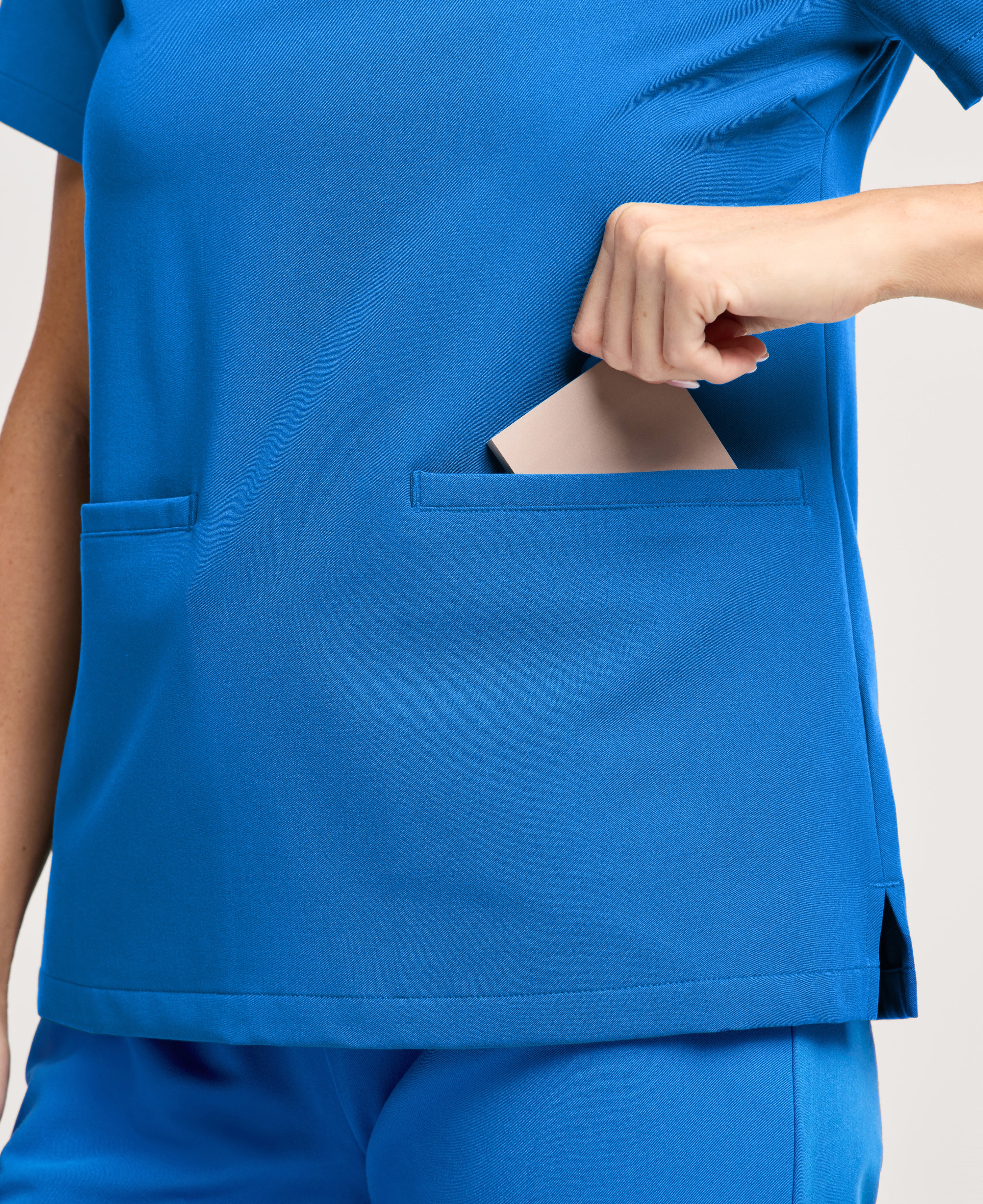 Jaanuu Helia Slim Notched V-Neck Scrub Top in Royal Blue, product photo 3 of 6