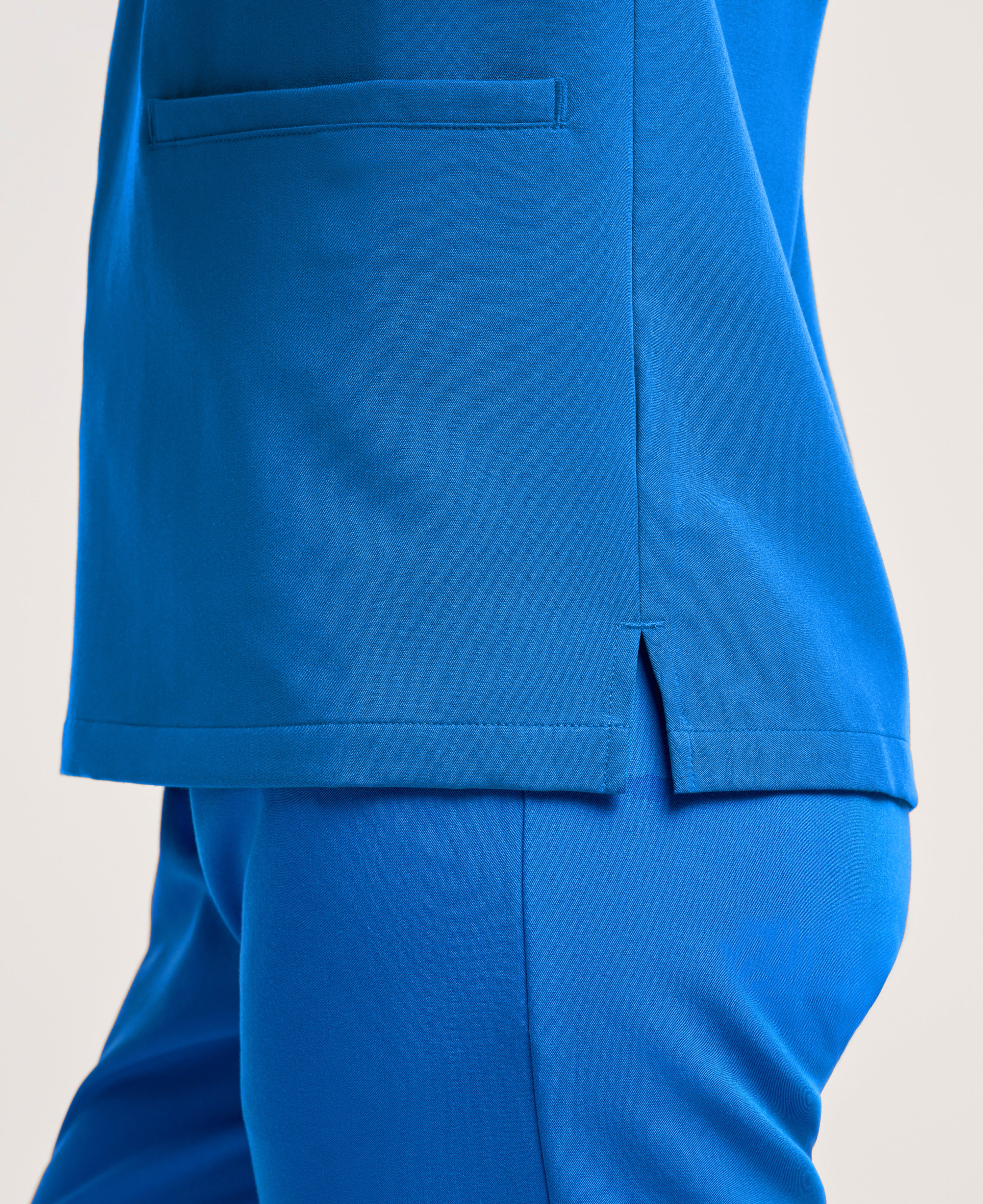 Jaanuu Helia Slim Notched V-Neck Scrub Top in Royal Blue, product photo 6 of 6