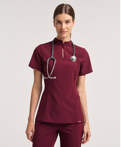 Jaanuu Alex Mock-Neck Scrub Top in Burgundy, product photo 1 of 6