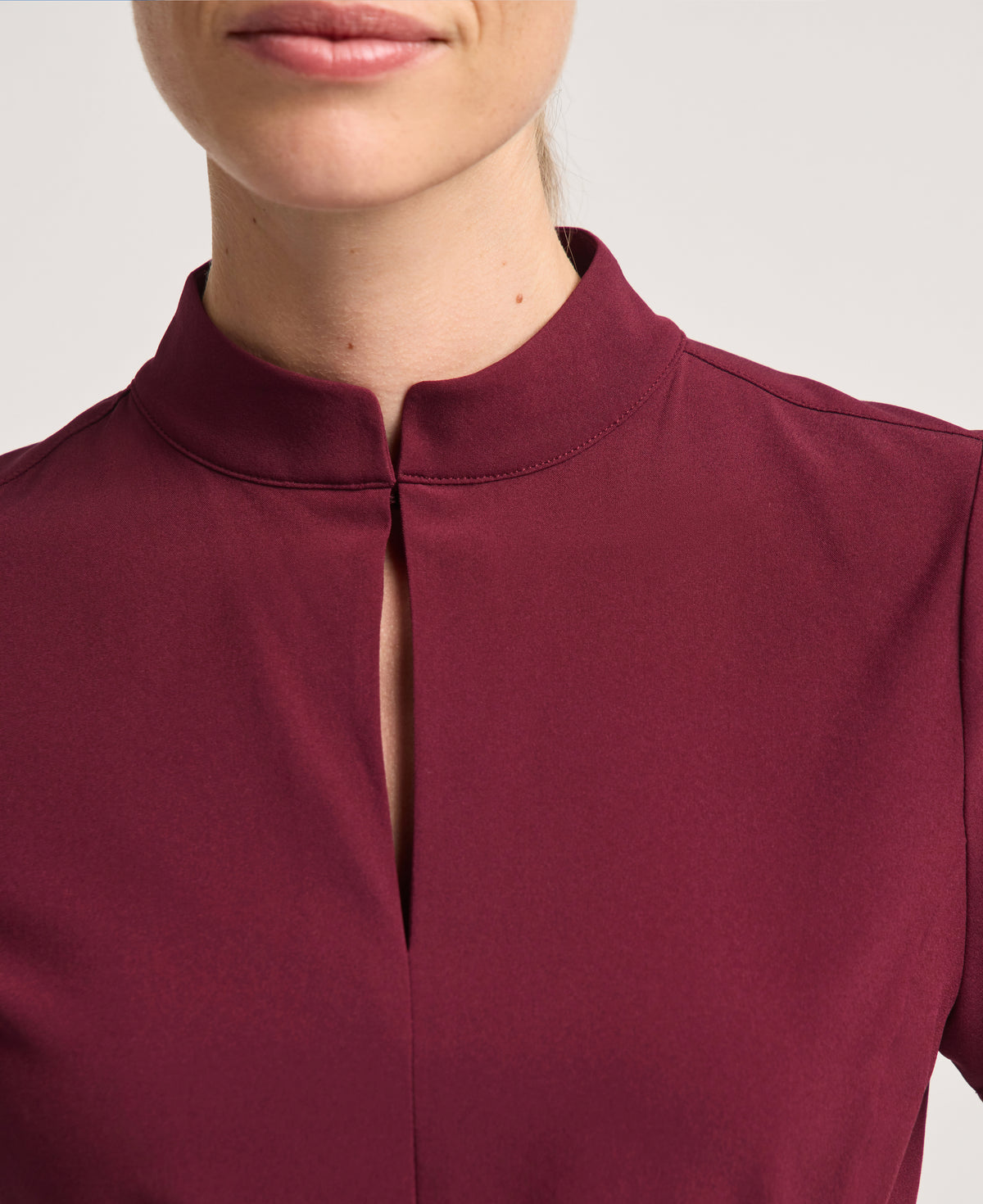 Jaanuu Alex Mock-Neck Scrub Top in Burgundy, product photo 3 of 6