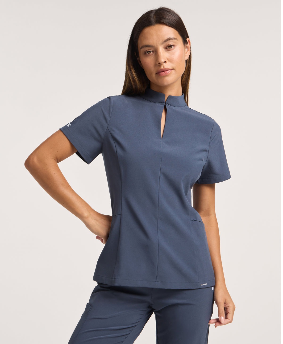 Jaanuu Alex Mock-Neck Scrub Top in Carbon Gray, product photo 1 of 6