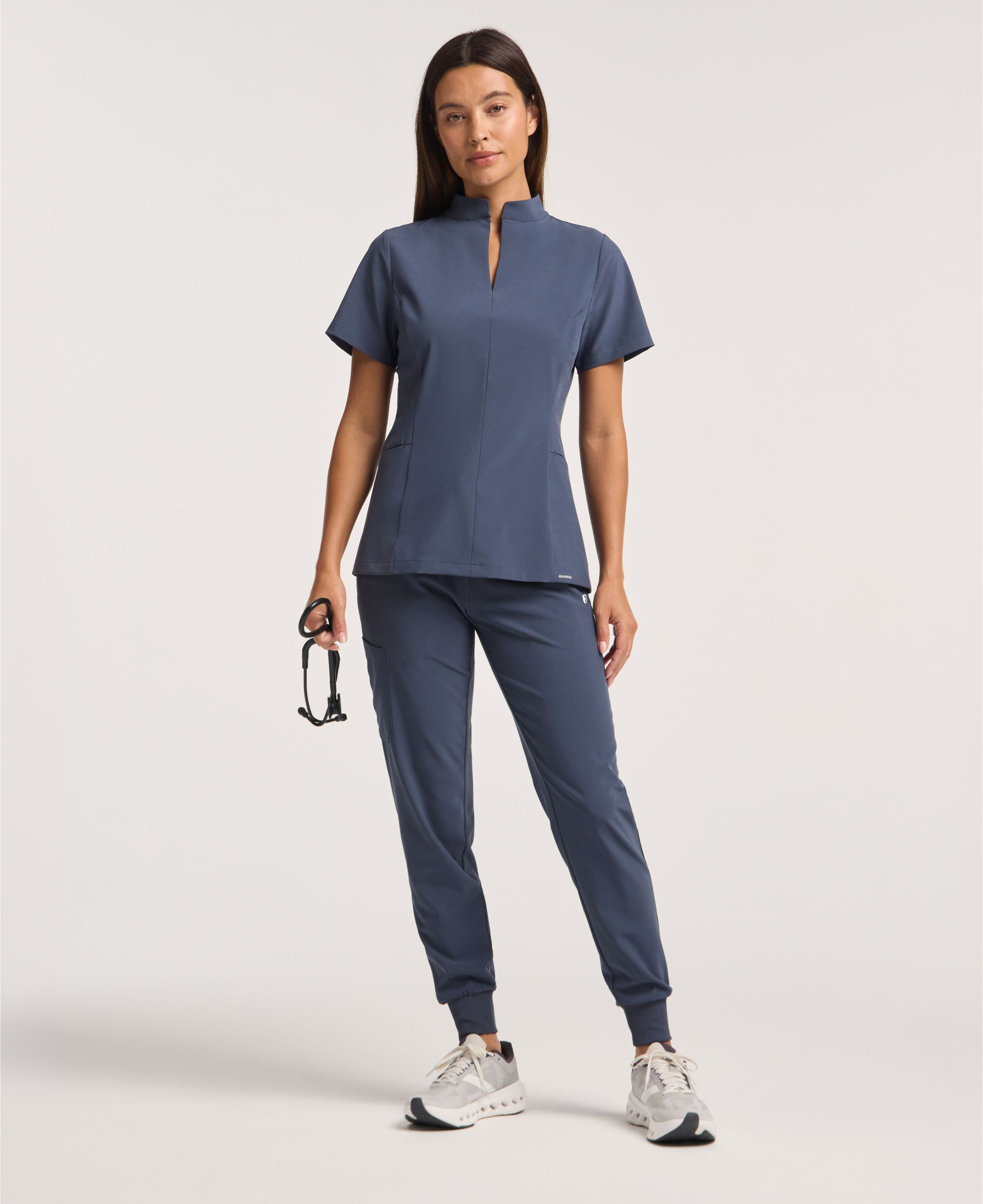 Jaanuu Alex Mock-Neck Scrub Top in Carbon Gray, product photo 2 of 6
