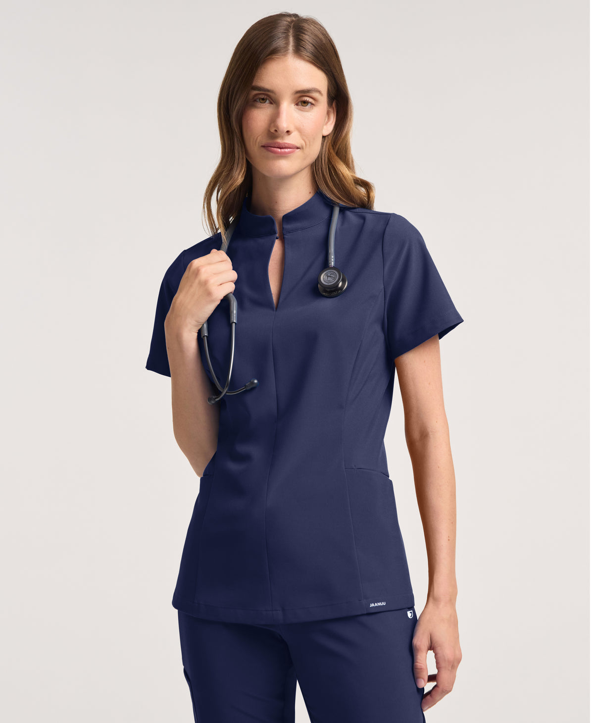 Jaanuu Alex Mock-Neck Scrub Top in Midnight Navy, product photo 1 of 6