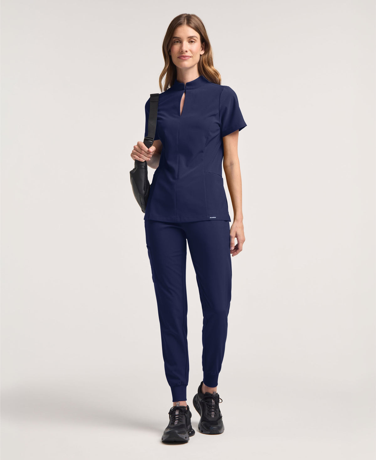 Jaanuu Alex Mock-Neck Scrub Top in Midnight Navy, product photo 4 of 6