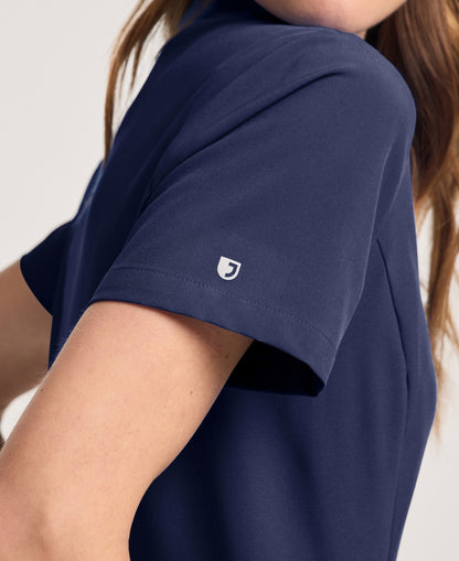 Jaanuu Alex Mock-Neck Scrub Top in Midnight Navy, product photo 6 of 6