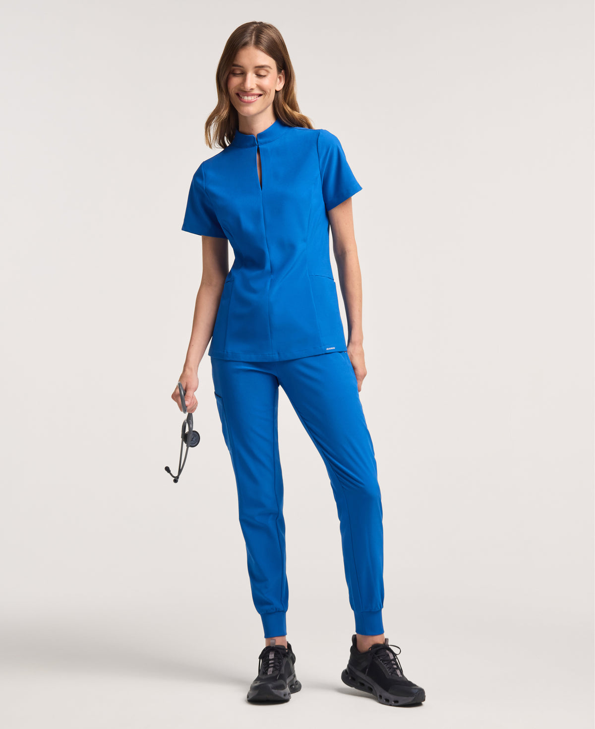 Jaanuu Alex Mock-Neck Scrub Top in Royal Blue, product photo 4 of 6