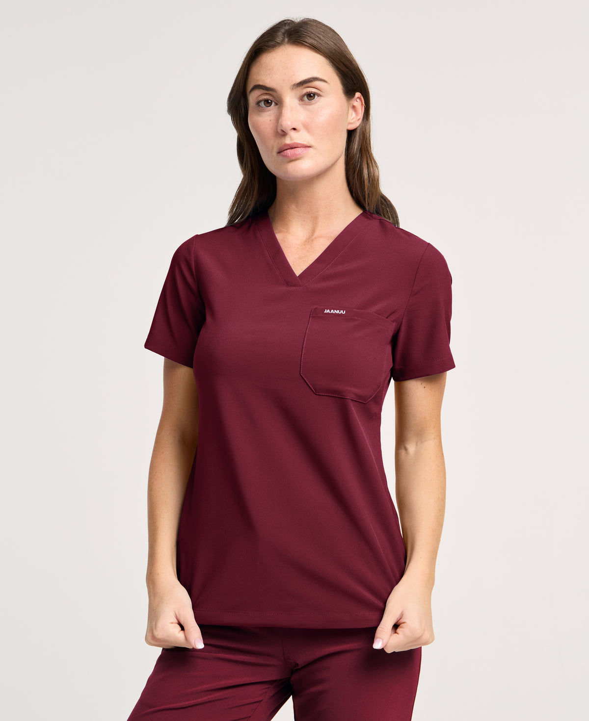 Jaanuu Harlow Slim 1-Pocket Scrub Top in Burgundy, product photo 2 of 6