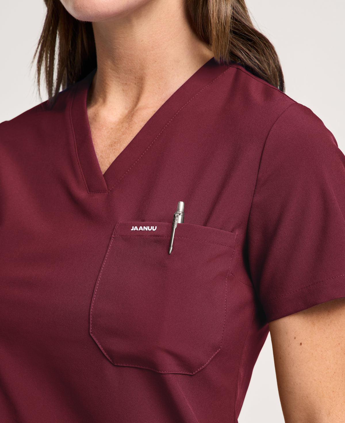 Jaanuu Harlow Slim 1-Pocket Scrub Top in Burgundy, product photo 3 of 6